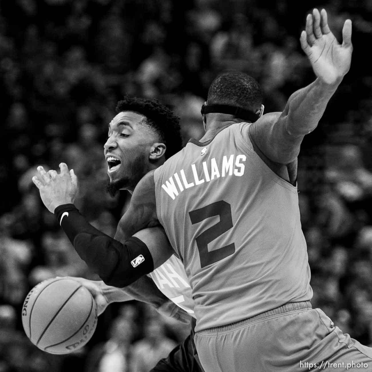 (Trent Nelson  |  The Salt Lake Tribune) Utah Jazz guard Donovan Mitchell (45) tangles with Charlotte Hornets forward Marvin Williams (2) as the Utah Jazz host the Charlotte Hornets, NBA basketball in Salt Lake City on Friday, Jan. 10, 2020.