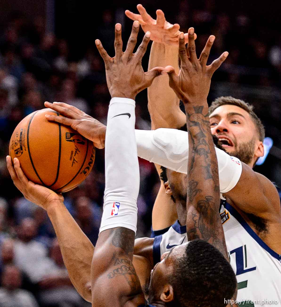 (Trent Nelson  |  The Salt Lake Tribune) Utah Jazz guard Donovan Mitchell (45) defended by Dallas Mavericks guard Delon Wright (55) and Dallas Mavericks forward Maxi Kleber (42) as the Utah Jazz host the Dallas Mavericks, NBA basketball in Salt Lake City on Saturday, Jan. 25, 2020.