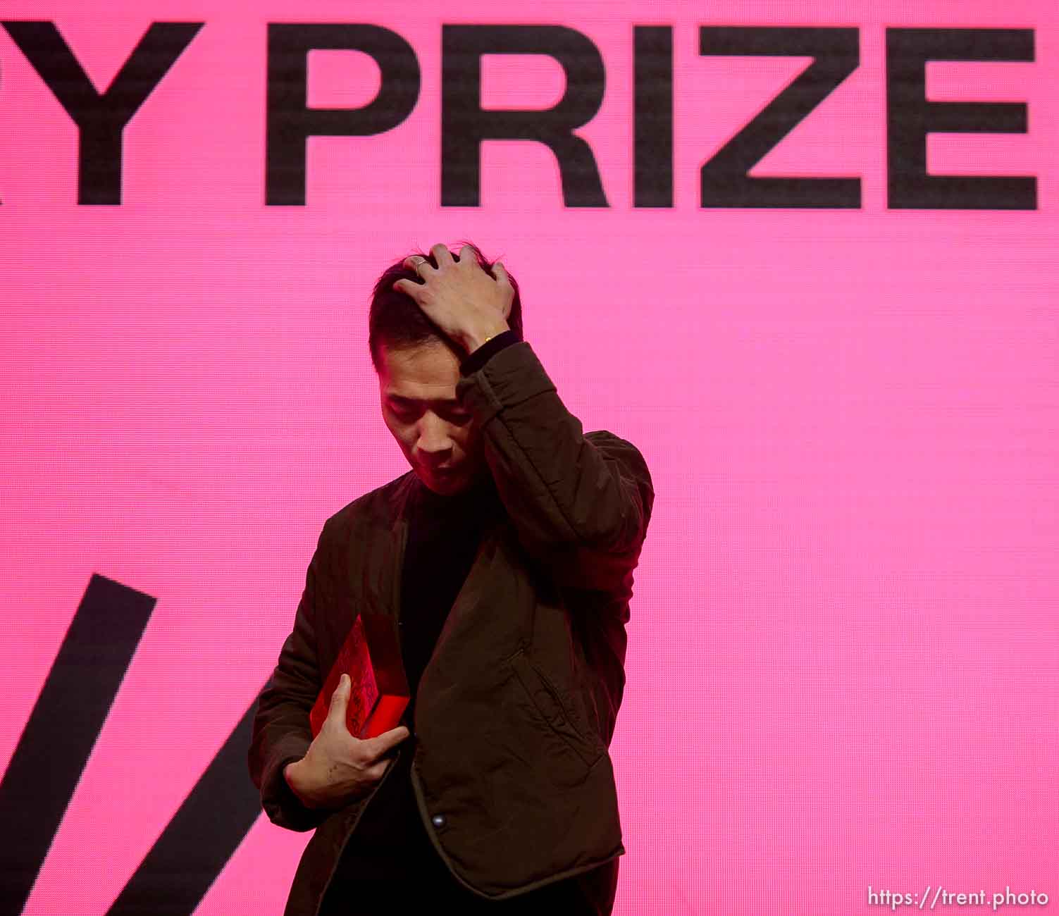 (Trent Nelson  |  The Salt Lake Tribune) Lee Isaac Chung reacts to winning the U.S. Dramatic Grand Jury Prize for his film Minari at the Awards Night Ceremony for the Sundance Film Festival in Kimball Junction on Saturday, Feb. 1, 2020.