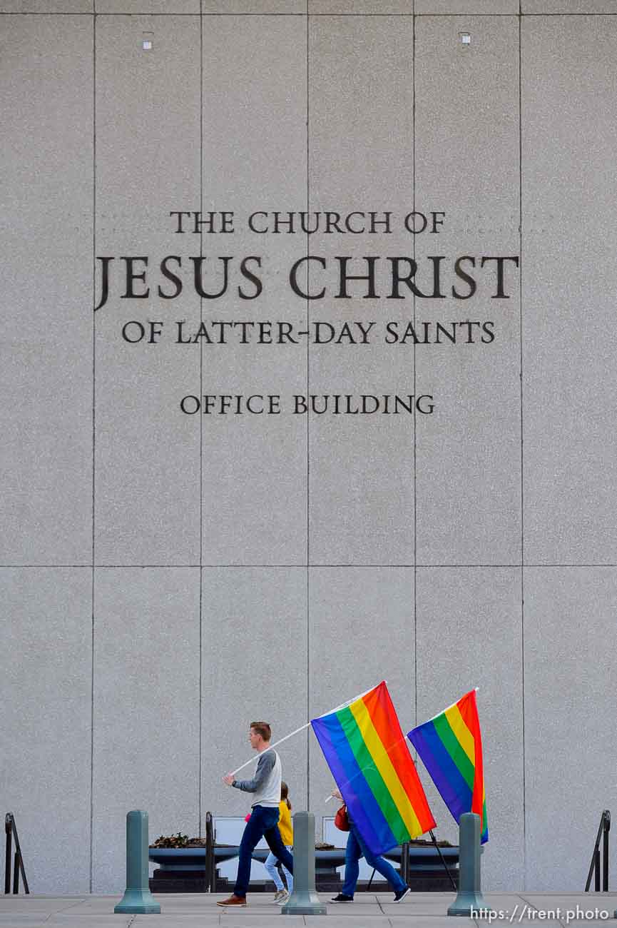 (Trent Nelson  |  The Salt Lake Tribune) Demonstrators at a rally about BYU's changing position on “romantic behavior” by same-sex couples march around the headquarters of The Church of Jesus Christ of Latter-day Saints in Salt Lake City on Friday, March 6, 2020.