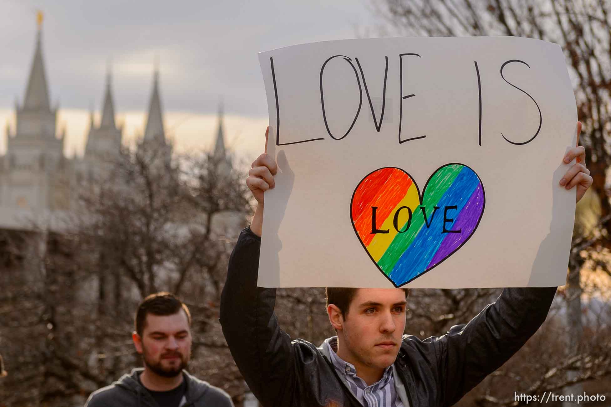 (Trent Nelson  |  The Salt Lake Tribune) Demonstrators at a rally about BYU's changing position on “romantic behavior” by same-sex couples gather in City Creek Park in Salt Lake City on Friday, March 6, 2020.