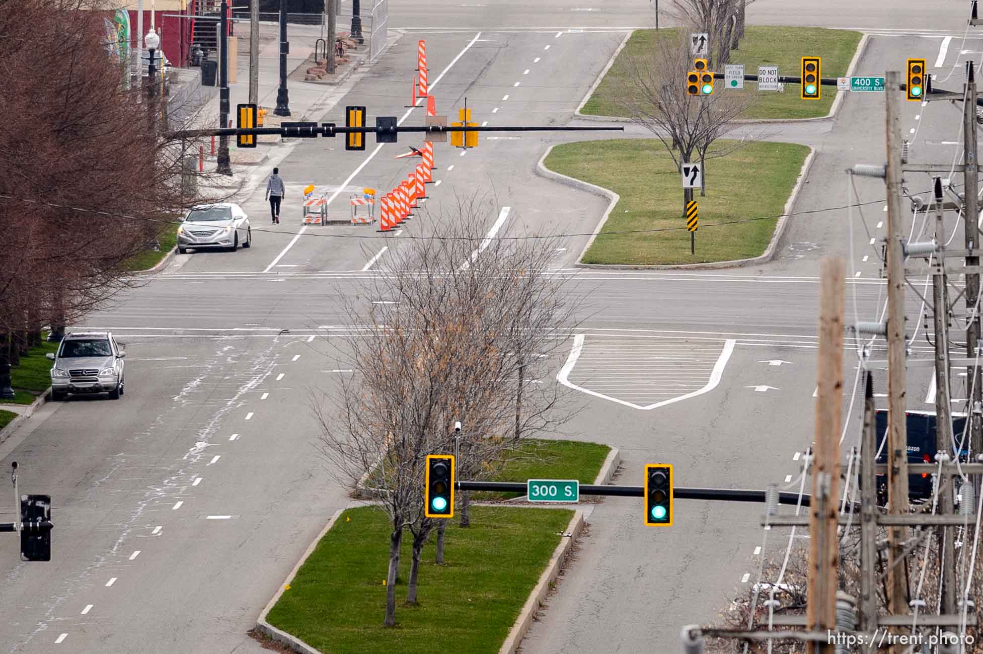 (Trent Nelson  |  The Salt Lake Tribune) Looking down 400 West as Salt Lake City continues to shelter in place to prevent the spread of COVID-19 on Monday, March 23, 2020.