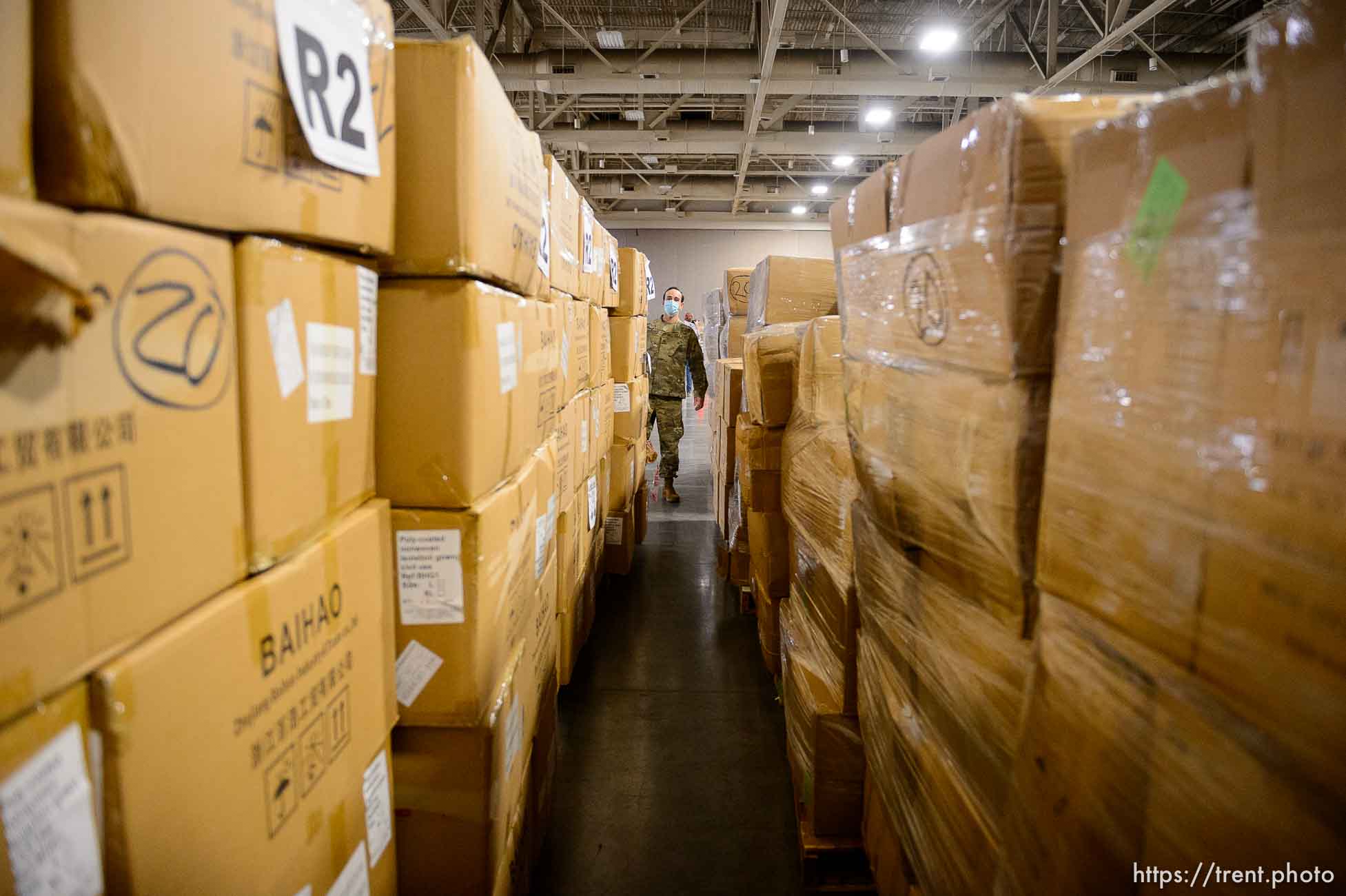 (Trent Nelson  |  The Salt Lake Tribune) Workers organize supplies at the Receiving, Staging and Shipping Center at the Salt Palace Convention Center in Salt Lake City on Friday, May 8, 2020. The center serves as a central location for personal protective equipment received by the State of Utah and sent to hospitals, local health departments and emergency managers.