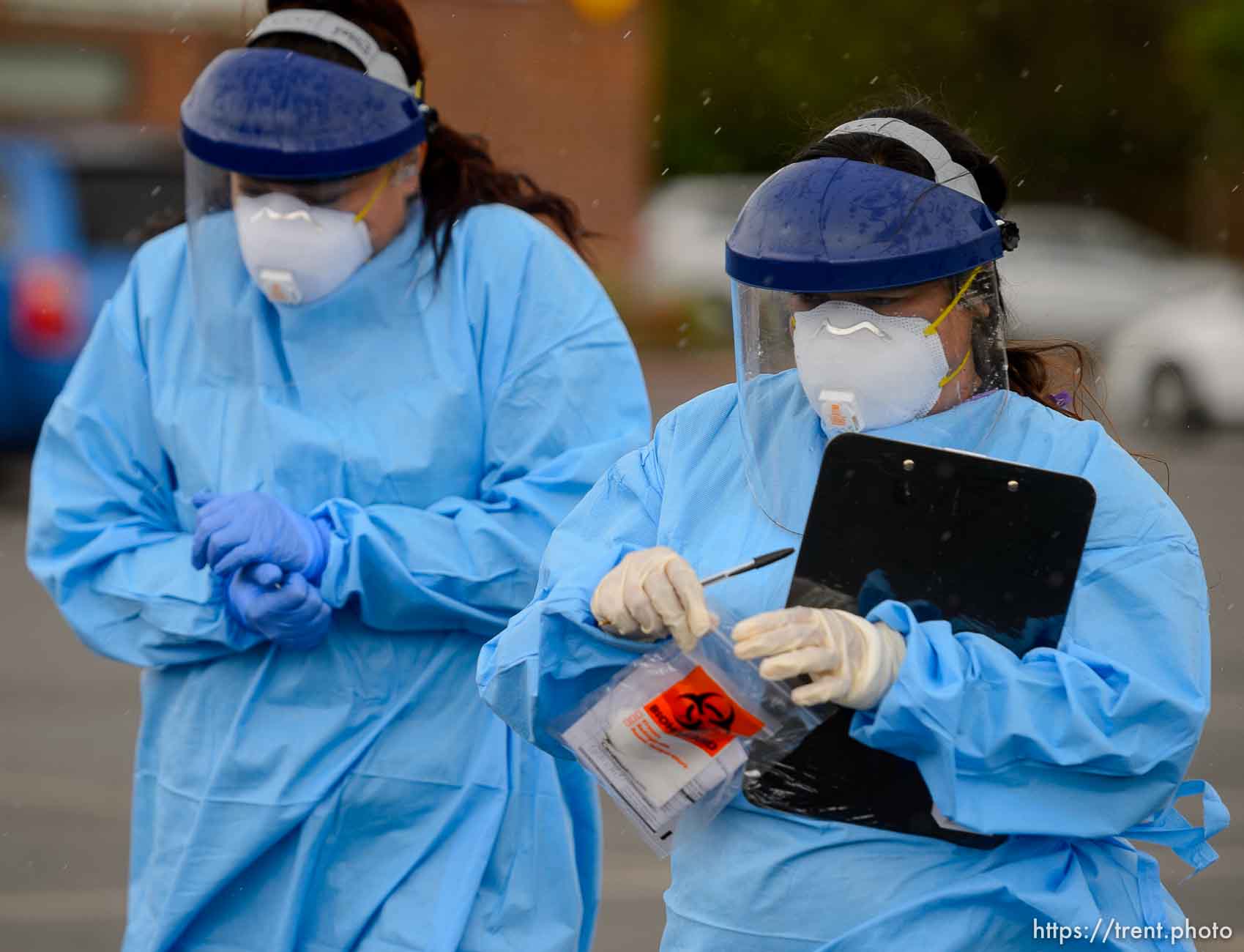 (Trent Nelson  |  The Salt Lake Tribune) Jessica Picaso and Estefania Mondragon working at a COVID-19 testing event sponsored by Comunidades Unidas at Mid-Valley Health Clinic in Midvale on Wednesday, May 20, 2020. The event was also sponsored by the Utah Partners for Health, Mid-Valley Health Clinic and the Utah Department of Health.