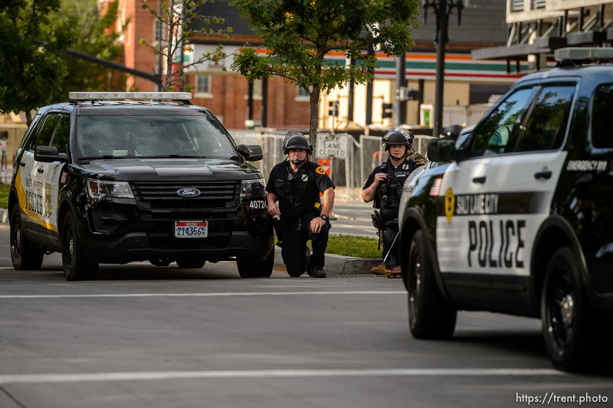 (Trent Nelson  |  The Salt Lake Tribune) A small group of Black Lives Matter activists led by Victoria Crosby kneel with National Guard and Salt Lake Police in front of the Public Safety Building in Salt Lake City on Tuesday, June 2, 2020.