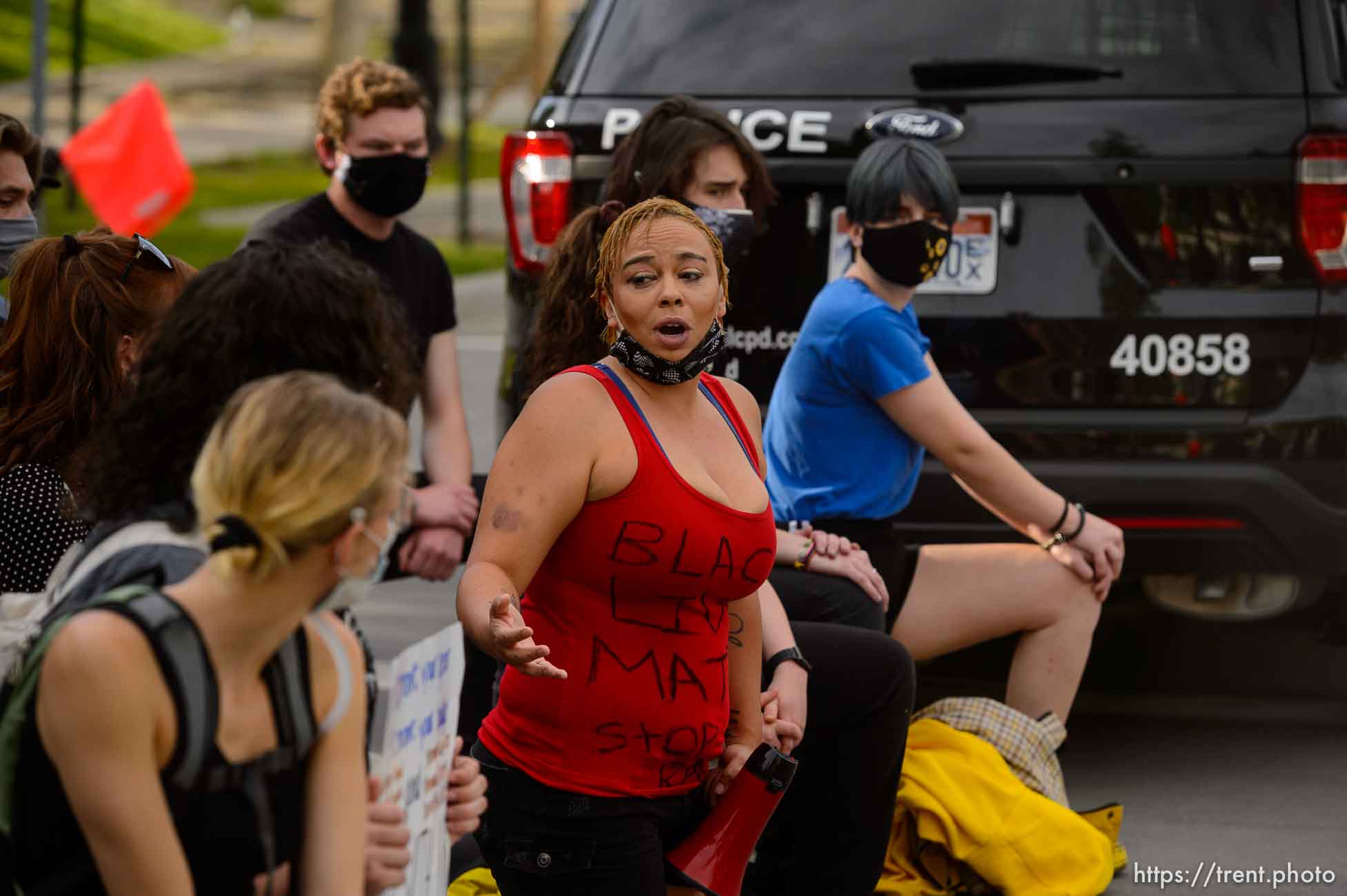 (Trent Nelson  |  The Salt Lake Tribune) A small group of Black Lives Matter activists led by Victoria Crosby kneel with National Guard and Salt Lake Police in front of the Public Safety Building in Salt Lake City on Tuesday, June 2, 2020.