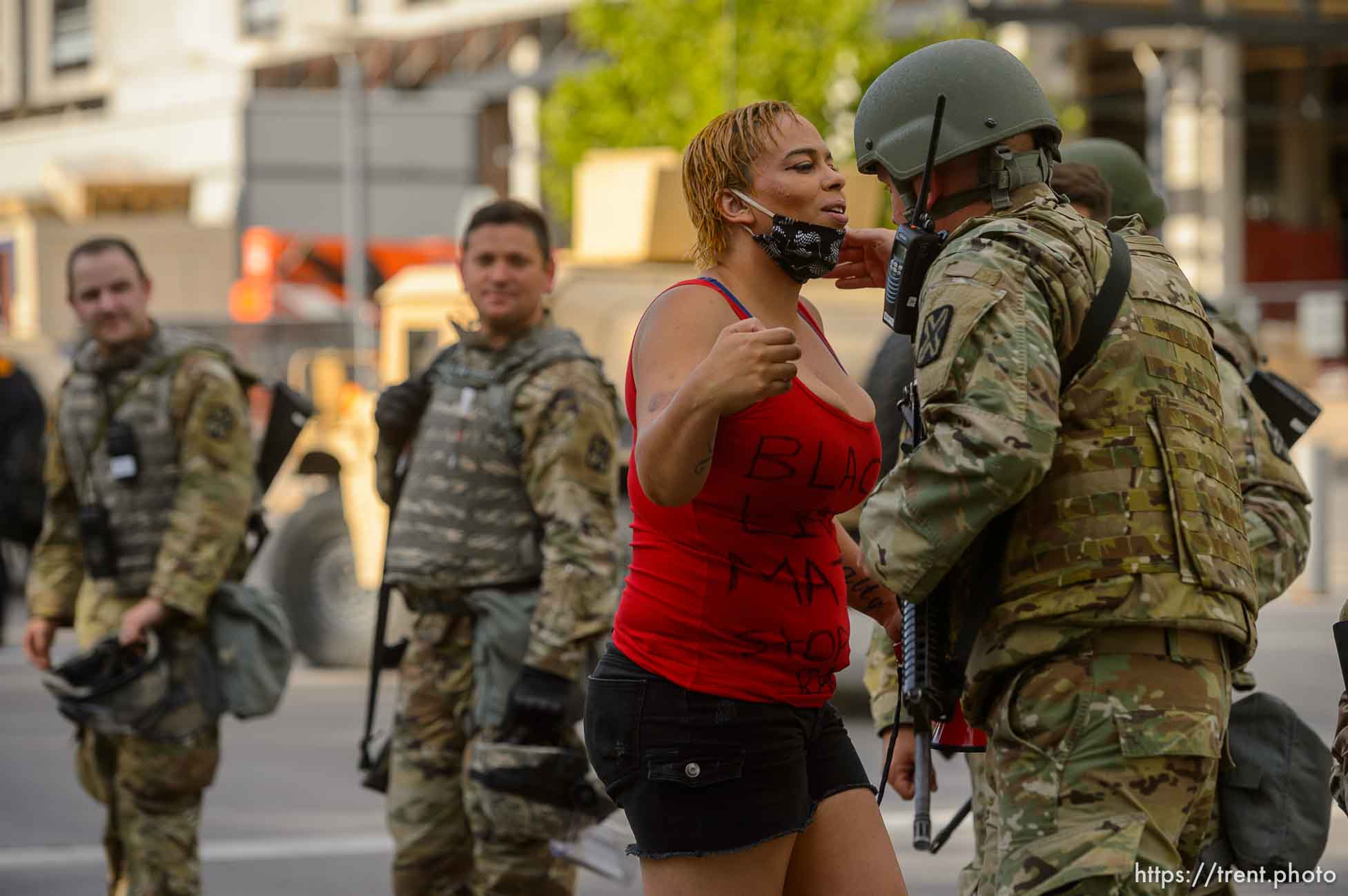 (Trent Nelson  |  The Salt Lake Tribune) Victoria Crosby shakes hands with and embraces members of the National Guard after she and a small group of Black Lives Matter activists knelt in front of the Public Safety Building in Salt Lake City on Tuesday, June 2, 2020.