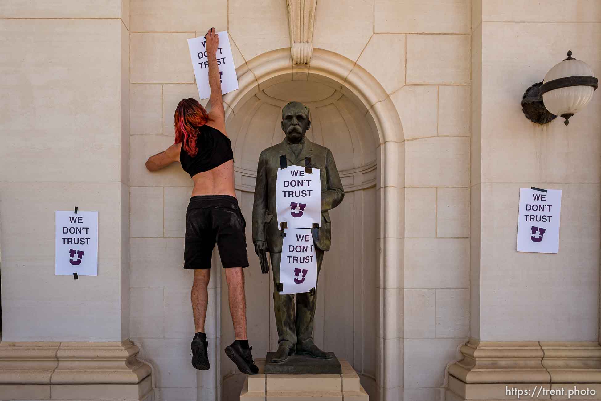 (Trent Nelson  |  The Salt Lake Tribune) Protesters put up posters at the University of Utah in Salt Lake City on Thursday, Sept. 3, 2020. The protest called  for President Ruth Watkins to resign and for the campus police department to be dissolved..