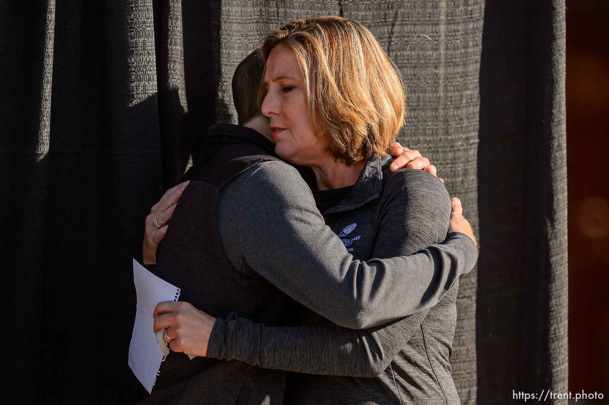 (Trent Nelson  |  The Salt Lake Tribune) Matt and Jill McCluskey, parents of Lauren McCluskey, embrace during a news conference announcing a settlement of their lawsuit against the University of Utah, in Salt Lake City on Thursday, Oct. 22, 2020.