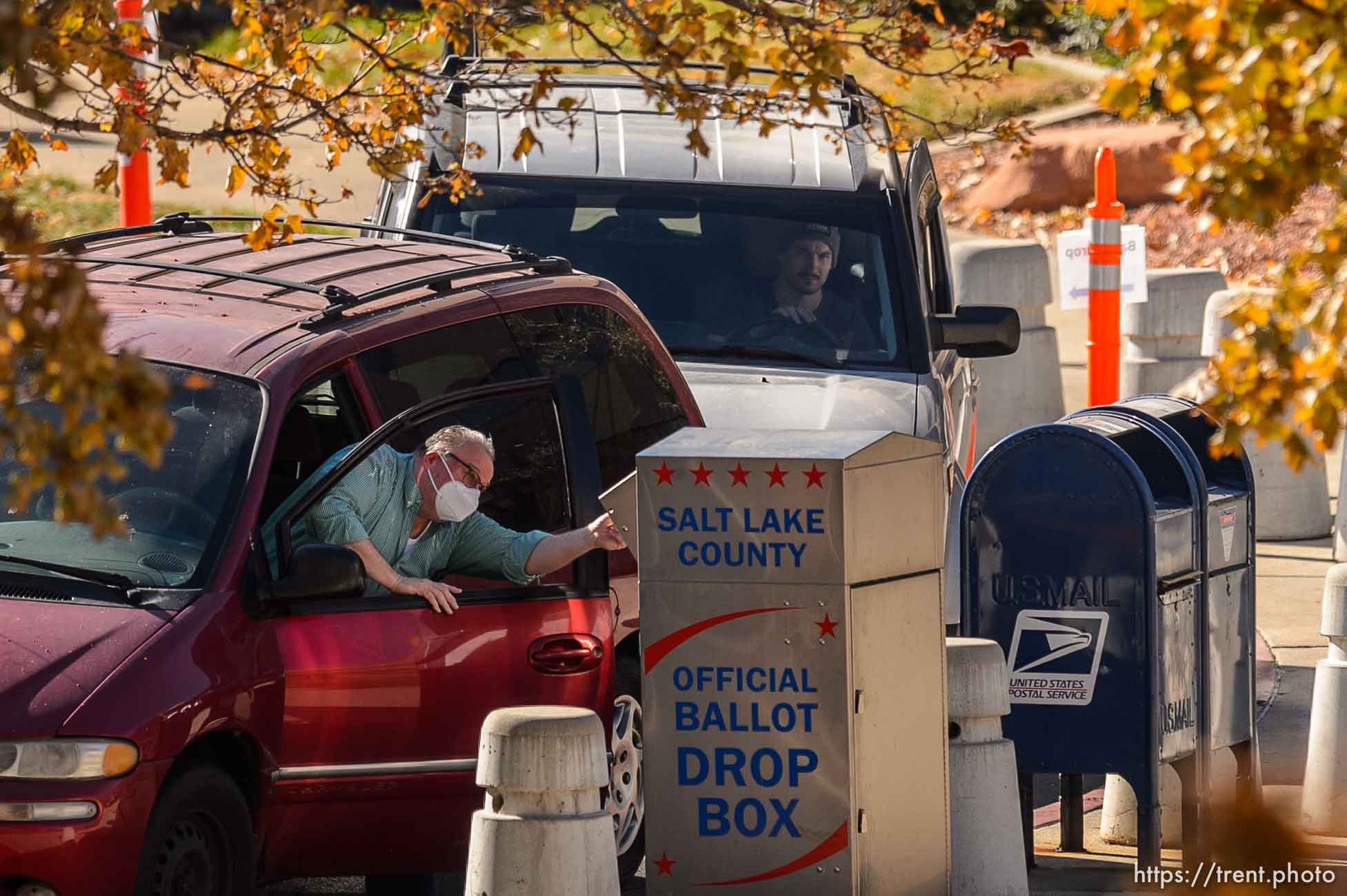 (Trent Nelson  |  The Salt Lake Tribune) Citizens cast ballots in a drop box at the Salt Lake County Offices in Salt Lake City on Monday, Nov. 2, 2020.