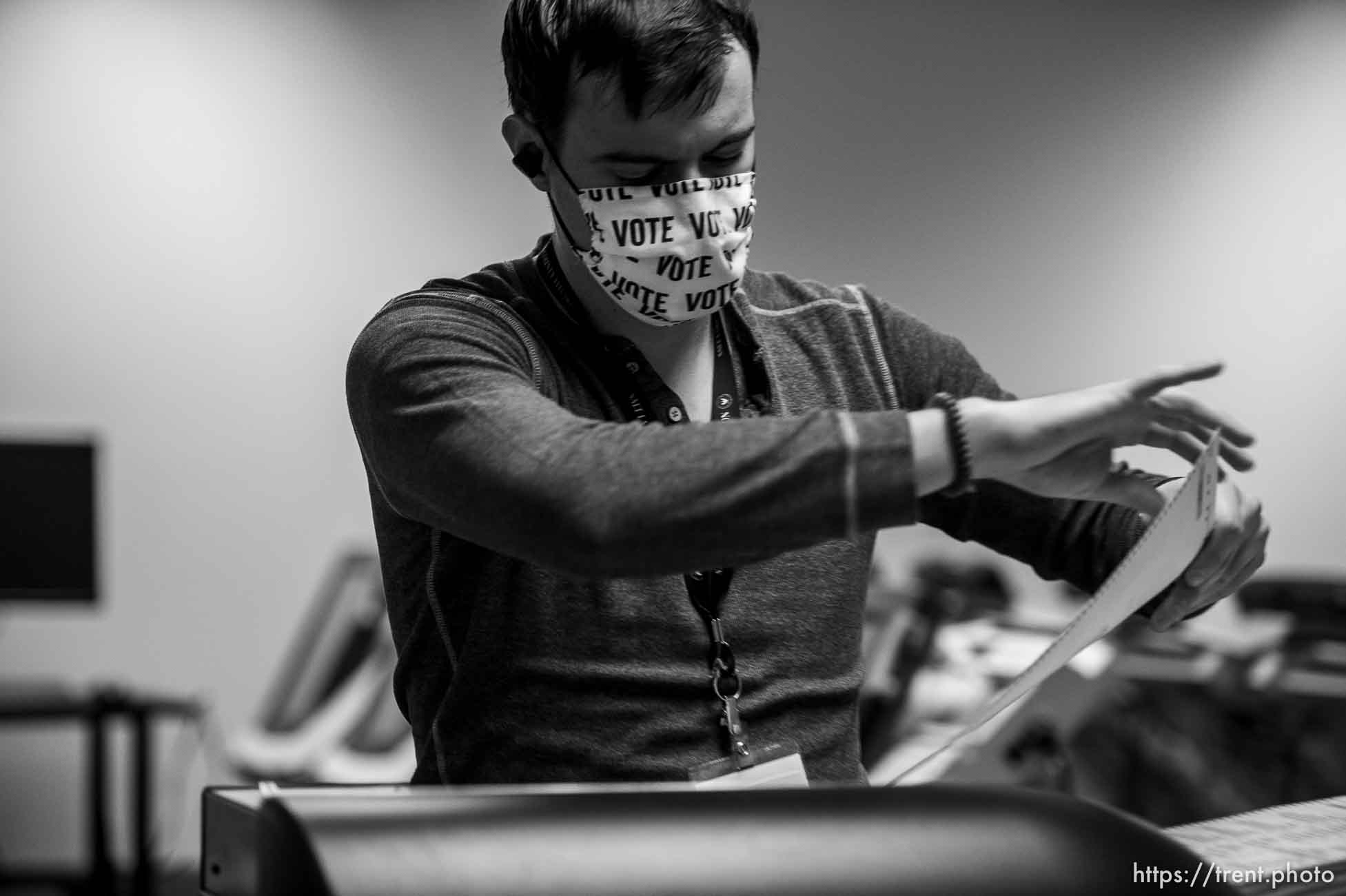 (Trent Nelson  |  The Salt Lake Tribune) Sam Stamos scans ballots at the Salt Lake County offices in Salt Lake City on Wednesday, Nov. 4, 2020.