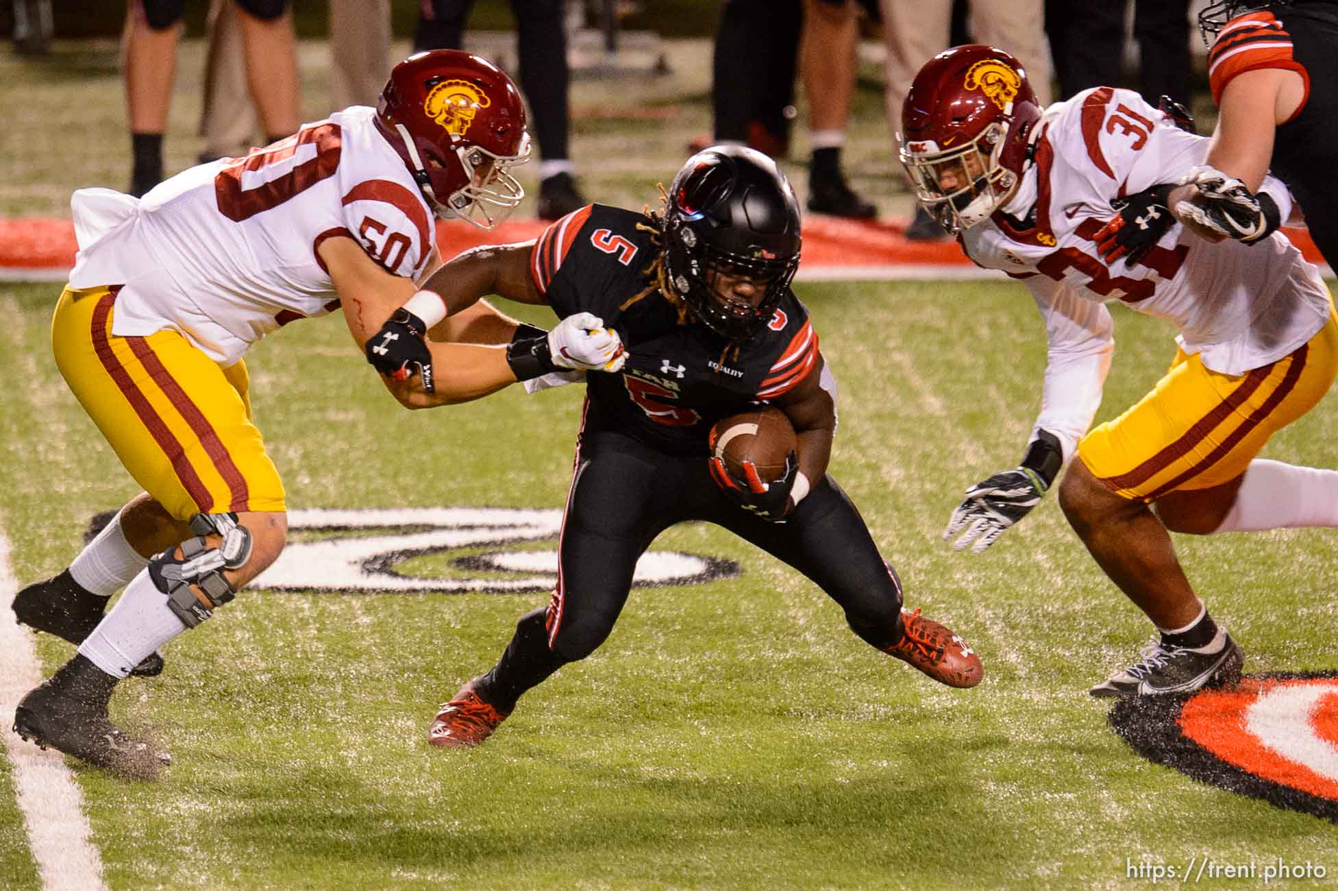 (Trent Nelson  |  The Salt Lake Tribune) Utah Utes running back Jordan Wilmore (5) is stopped as the Utah Utes host the USC Trojans, NCAA football at Rice-Eccles Stadium in Salt Lake City on Saturday, Nov. 21, 2020.