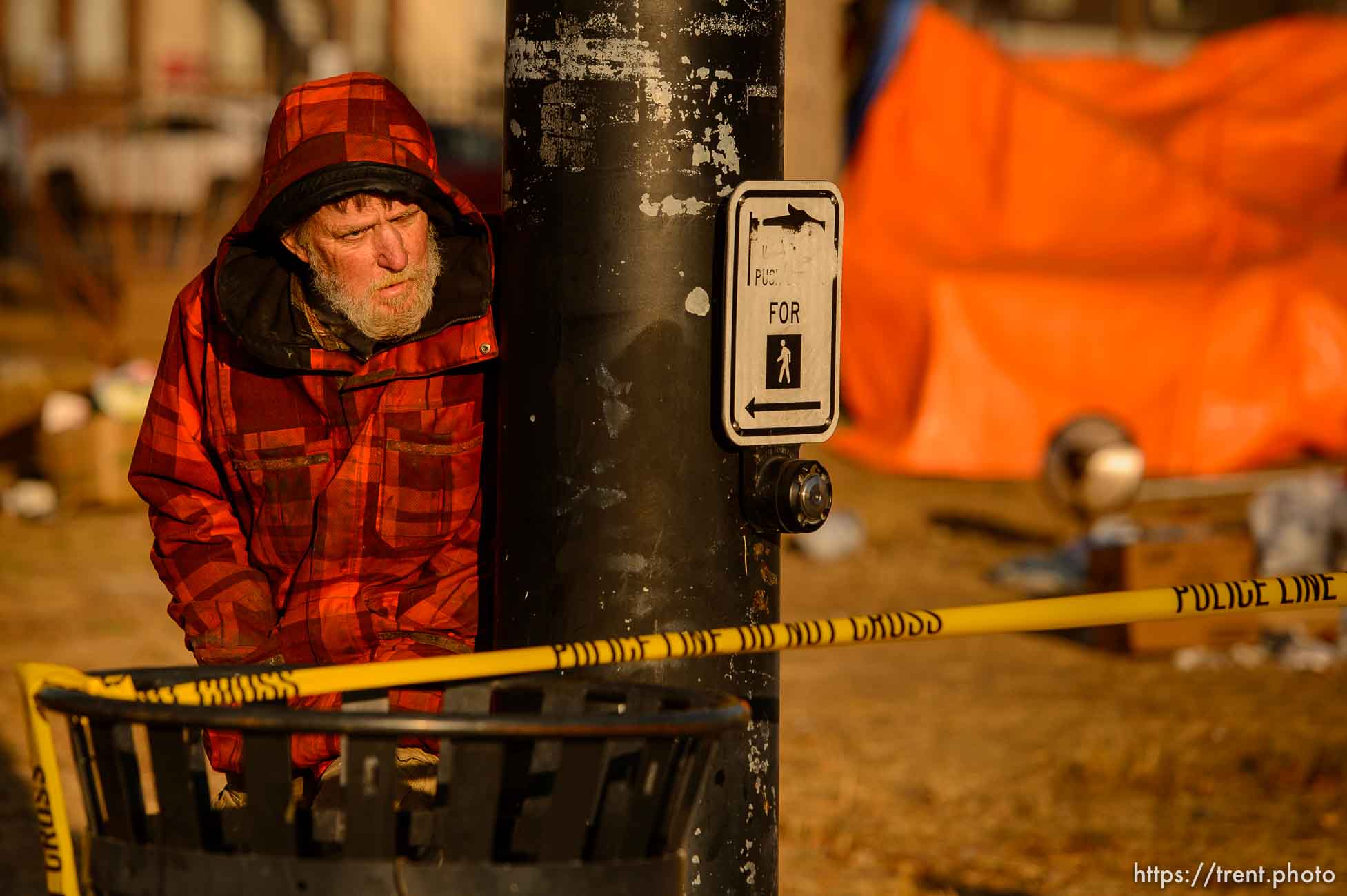 (Trent Nelson  |  The Salt Lake Tribune) Salt Lake City police officers working the cleanup of a series of campsites in Salt Lake City on Wednesday, Dec. 9, 2020.