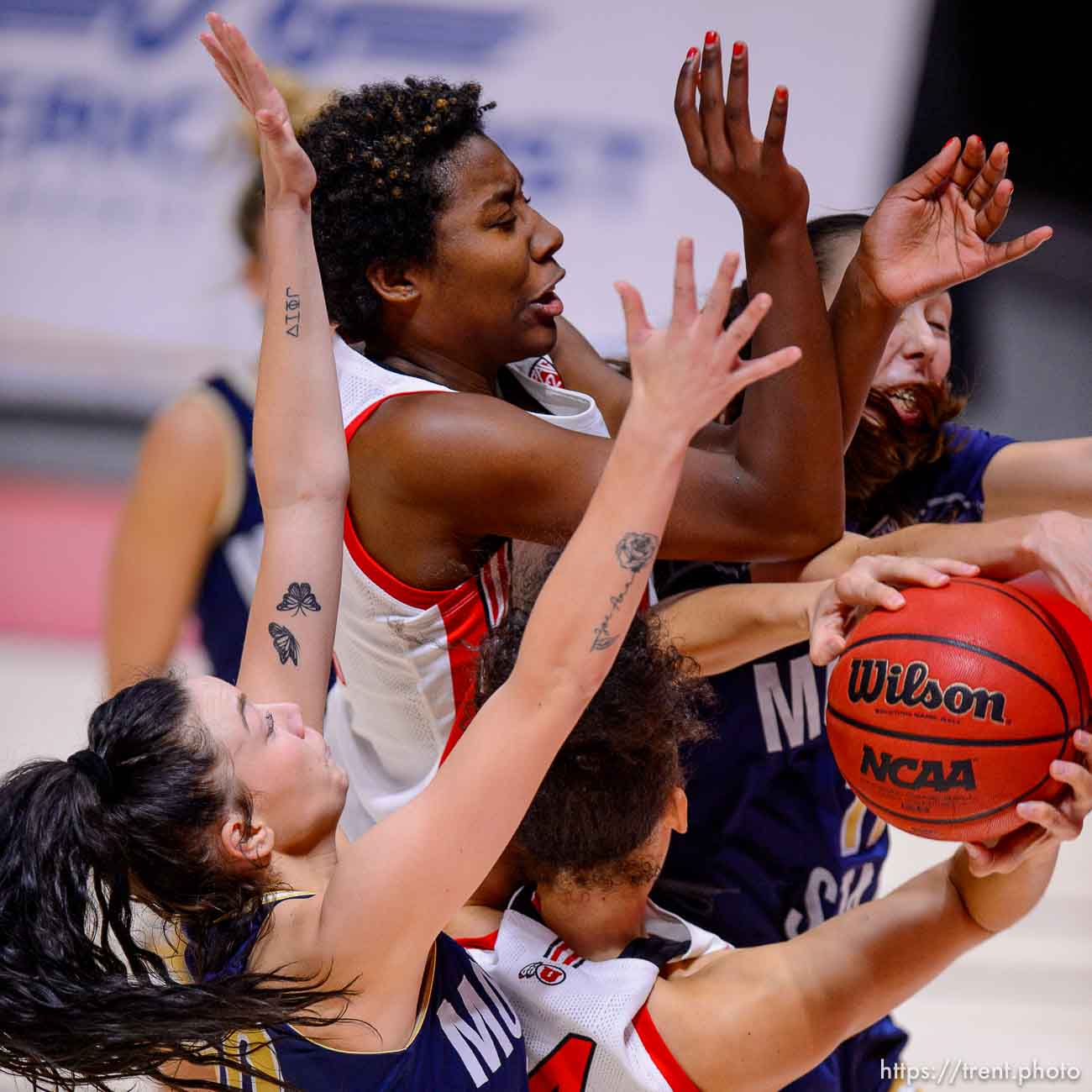 (Trent Nelson  |  The Salt Lake Tribune) Utah Utes forward Peyton McFarland (42) and Utah Utes guard Niyah Becker (14) as Utah hosts Montana State, NCAA basketball in Salt Lake City on Friday, Dec. 11, 2020.