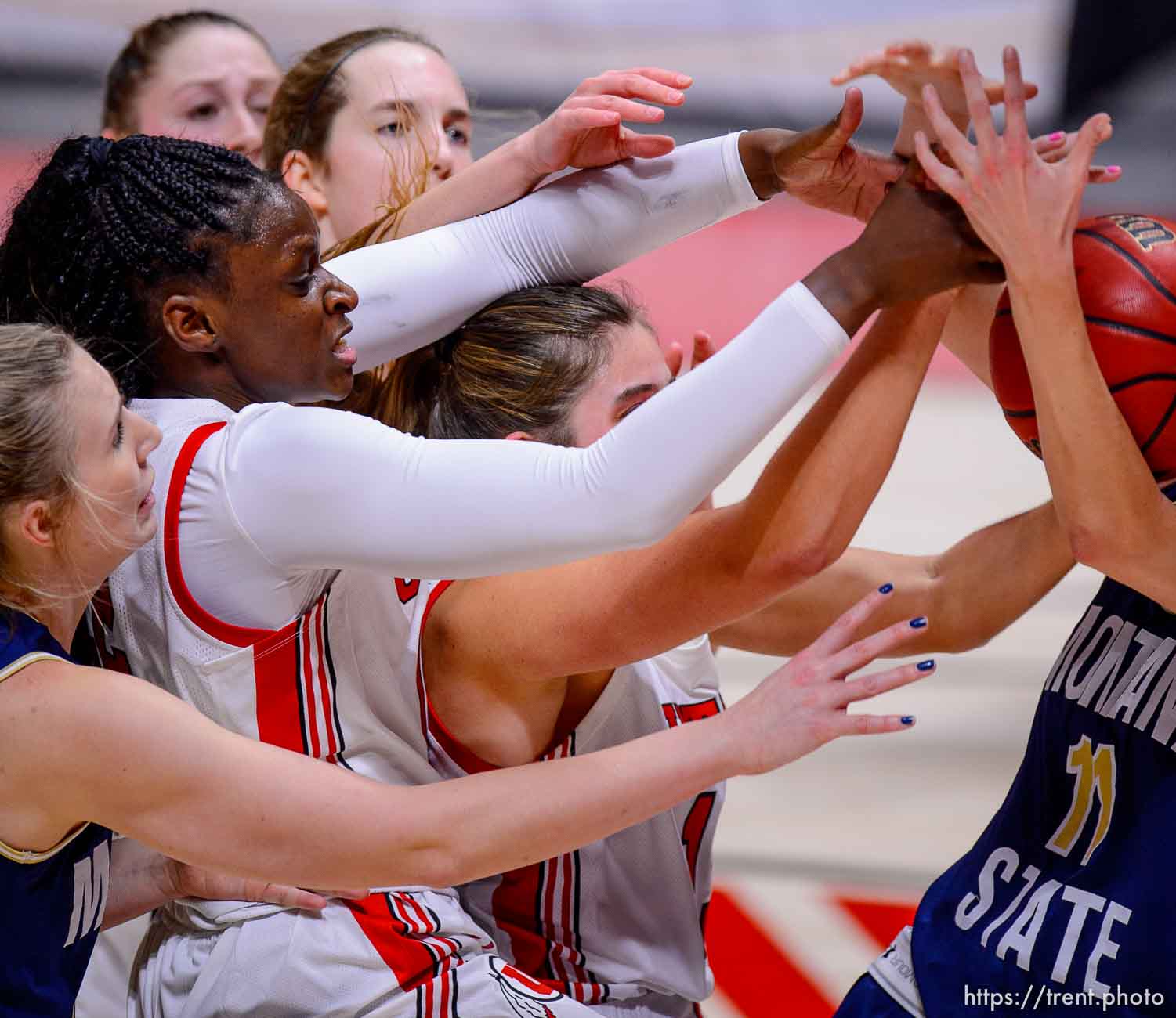 (Trent Nelson  |  The Salt Lake Tribune) Utah Utes forward Lola Pendande (12) and Utah Utes guard Kemery Martin (15) as Utah hosts Montana State, NCAA basketball in Salt Lake City on Friday, Dec. 11, 2020.