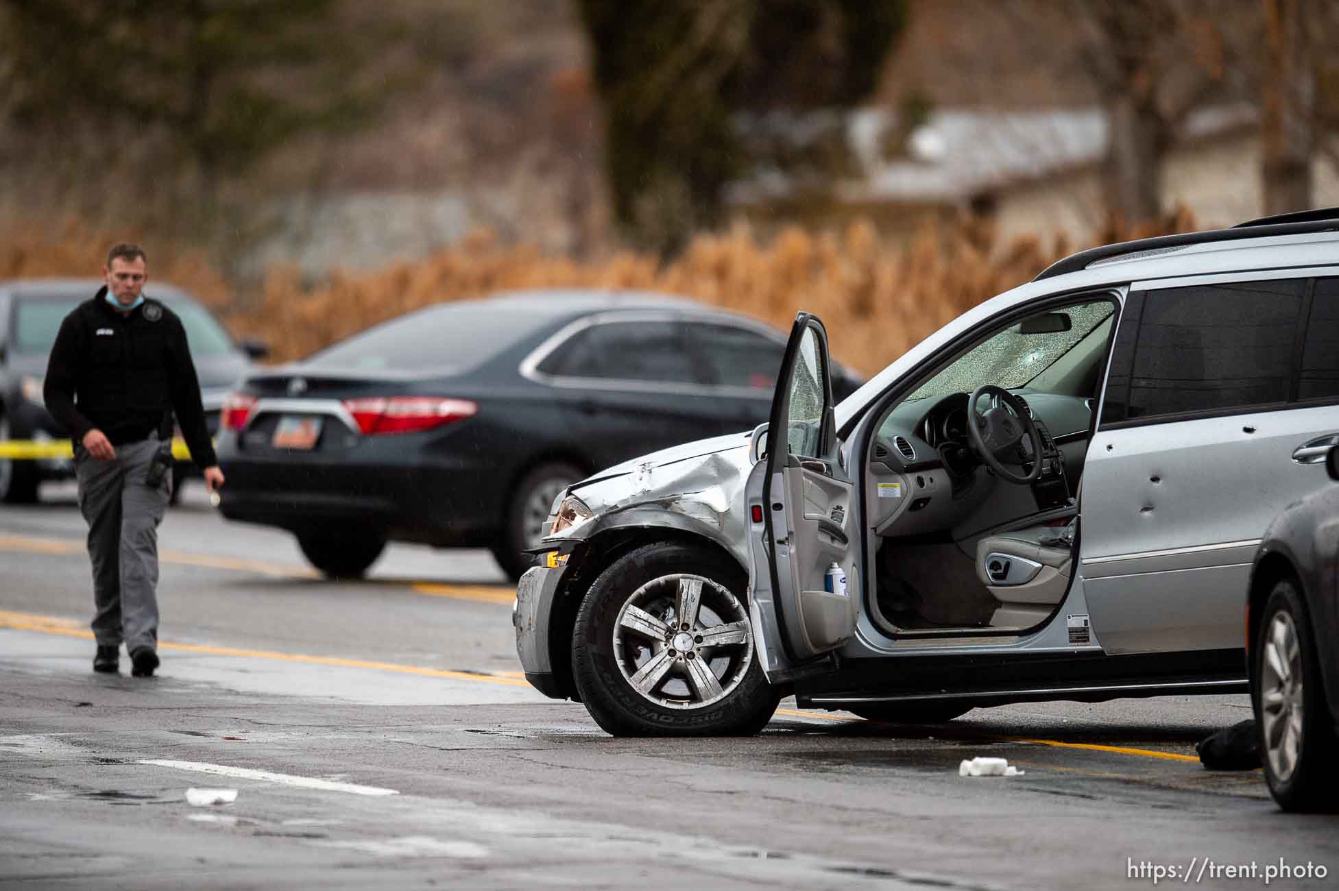 (Trent Nelson  |  The Salt Lake Tribune) Police at the scene of a shooting, at 700 North and 1860 West in Salt Lake City on Thursday, Dec. 17, 2020.