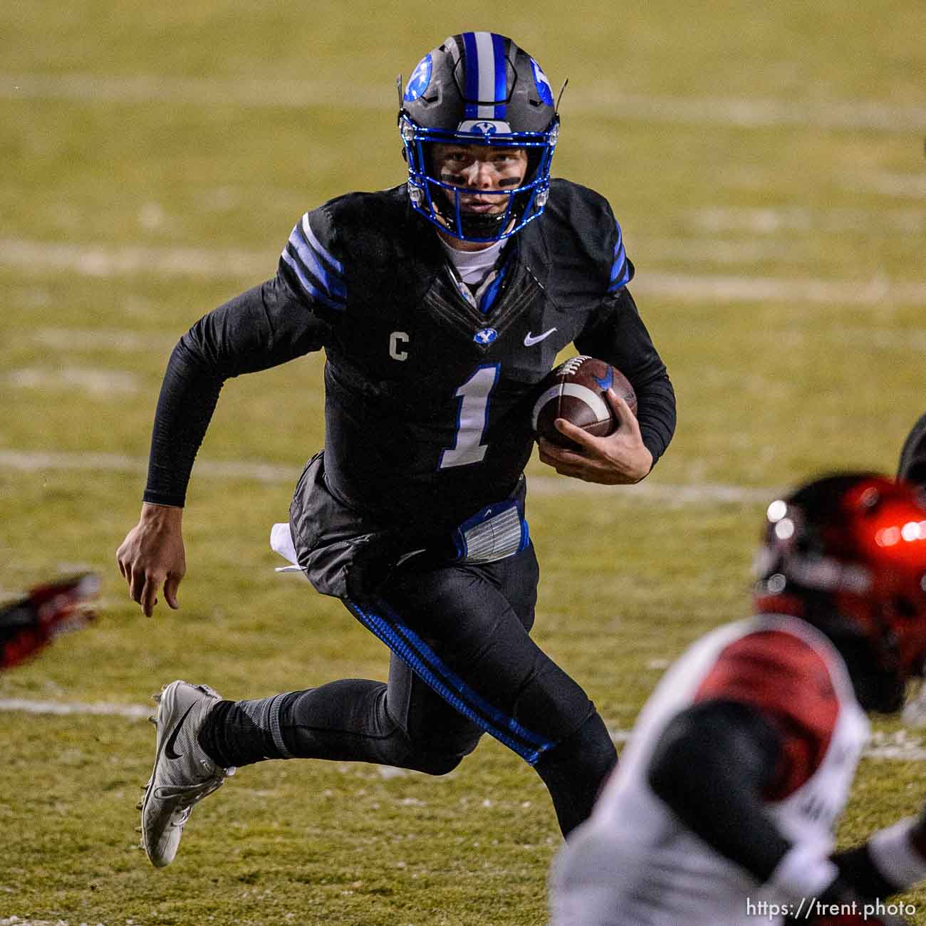 (Trent Nelson  |  The Salt Lake Tribune) Brigham Young Cougars quarterback Zach Wilson (1) runs as BYU hosts San Diego State, NCAA football in Provo on Saturday, December 12, 2020.