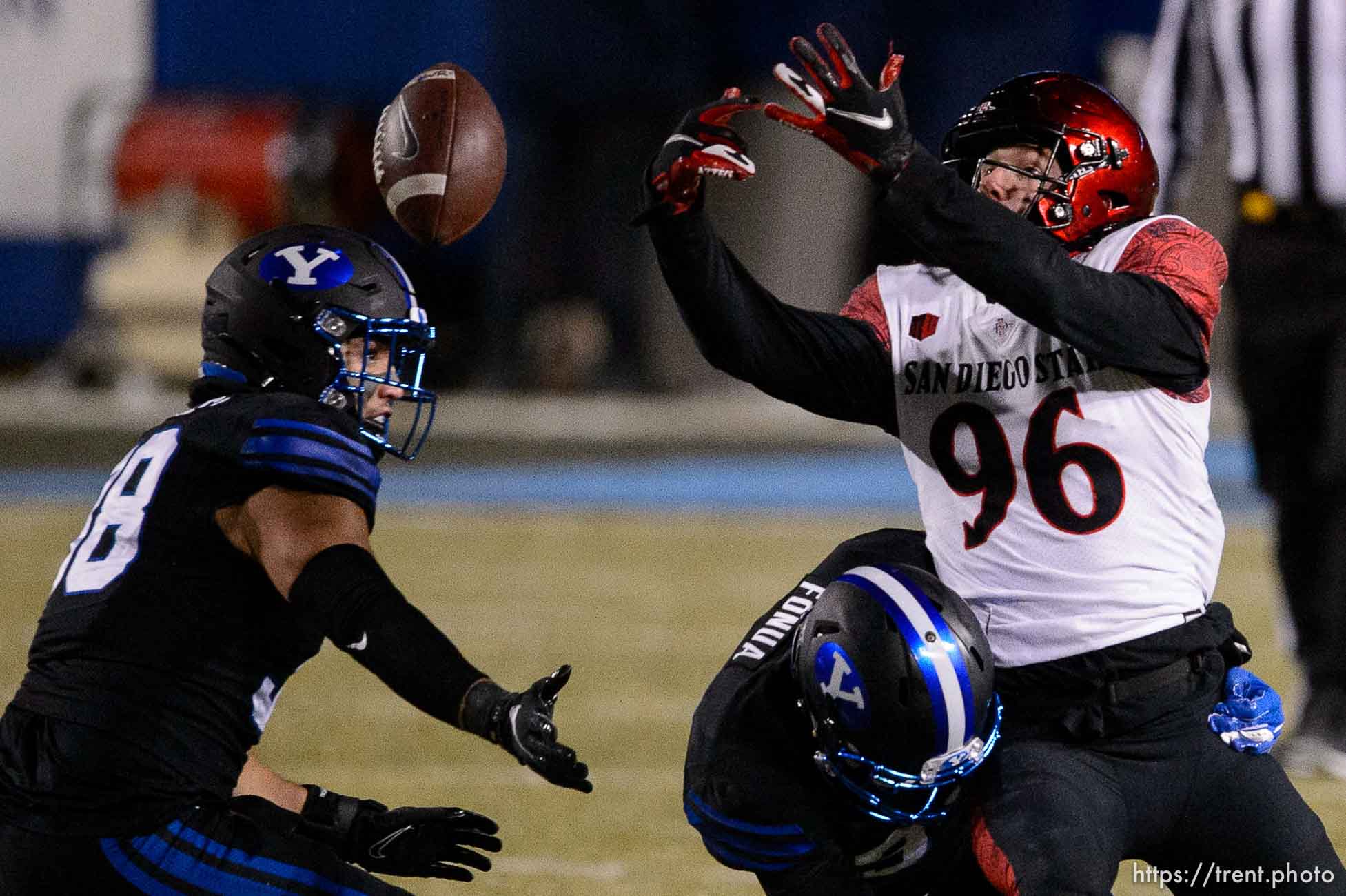 (Trent Nelson  |  The Salt Lake Tribune) San Diego State Aztecs wide receiver Elijah Kothe (96) reaches for a bobbled pass as BYU hosts San Diego State, NCAA football in Provo on Saturday, December 12, 2020.