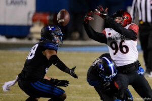 (Trent Nelson  |  The Salt Lake Tribune) San Diego State Aztecs wide receiver Elijah Kothe (96) reaches for a bobbled pass as BYU hosts San Diego State, NCAA football in Provo on Saturday, December 12, 2020.