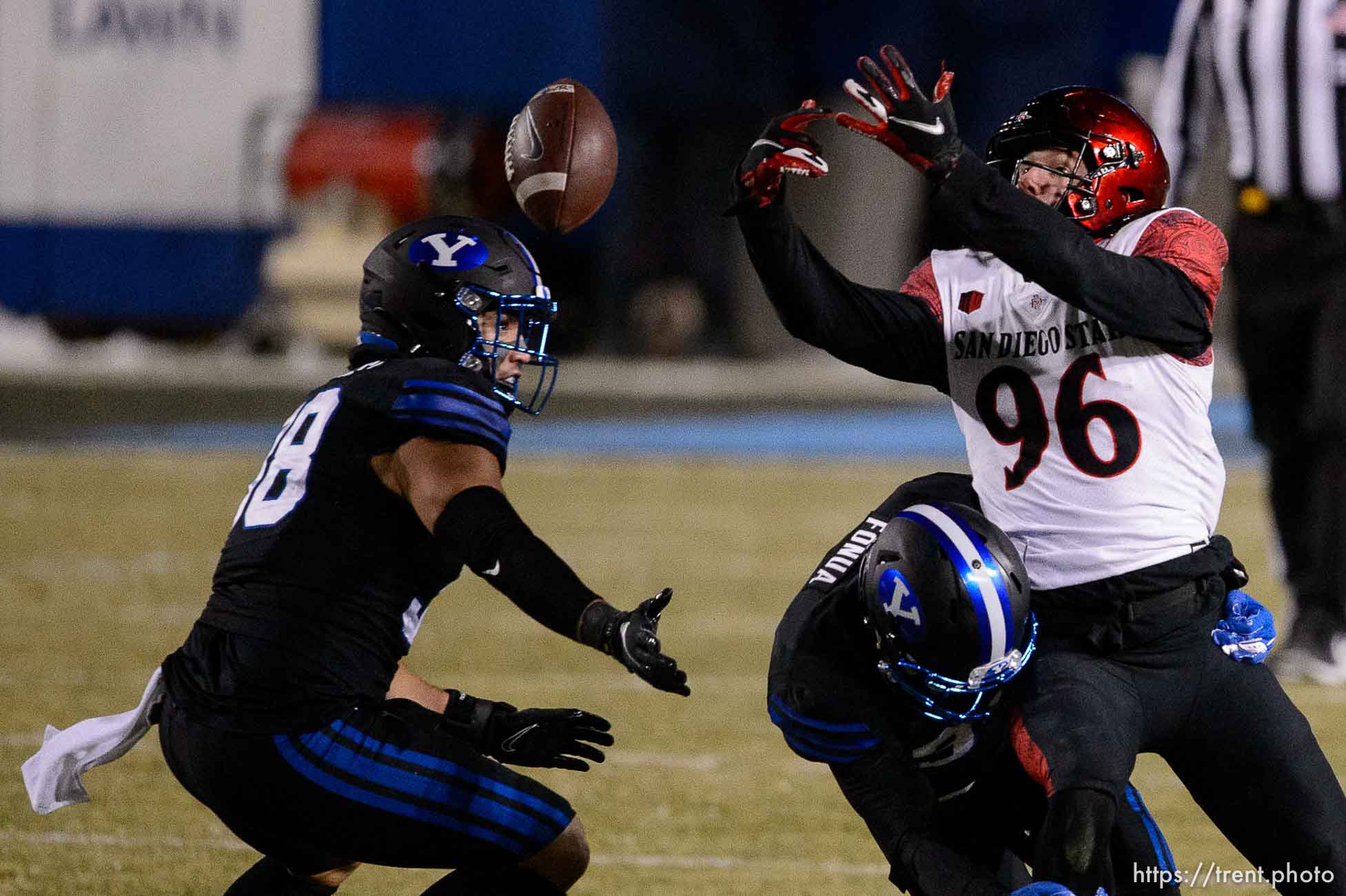 (Trent Nelson  |  The Salt Lake Tribune) San Diego State Aztecs wide receiver Elijah Kothe (96) reaches for a bobbled pass as BYU hosts San Diego State, NCAA football in Provo on Saturday, December 12, 2020.