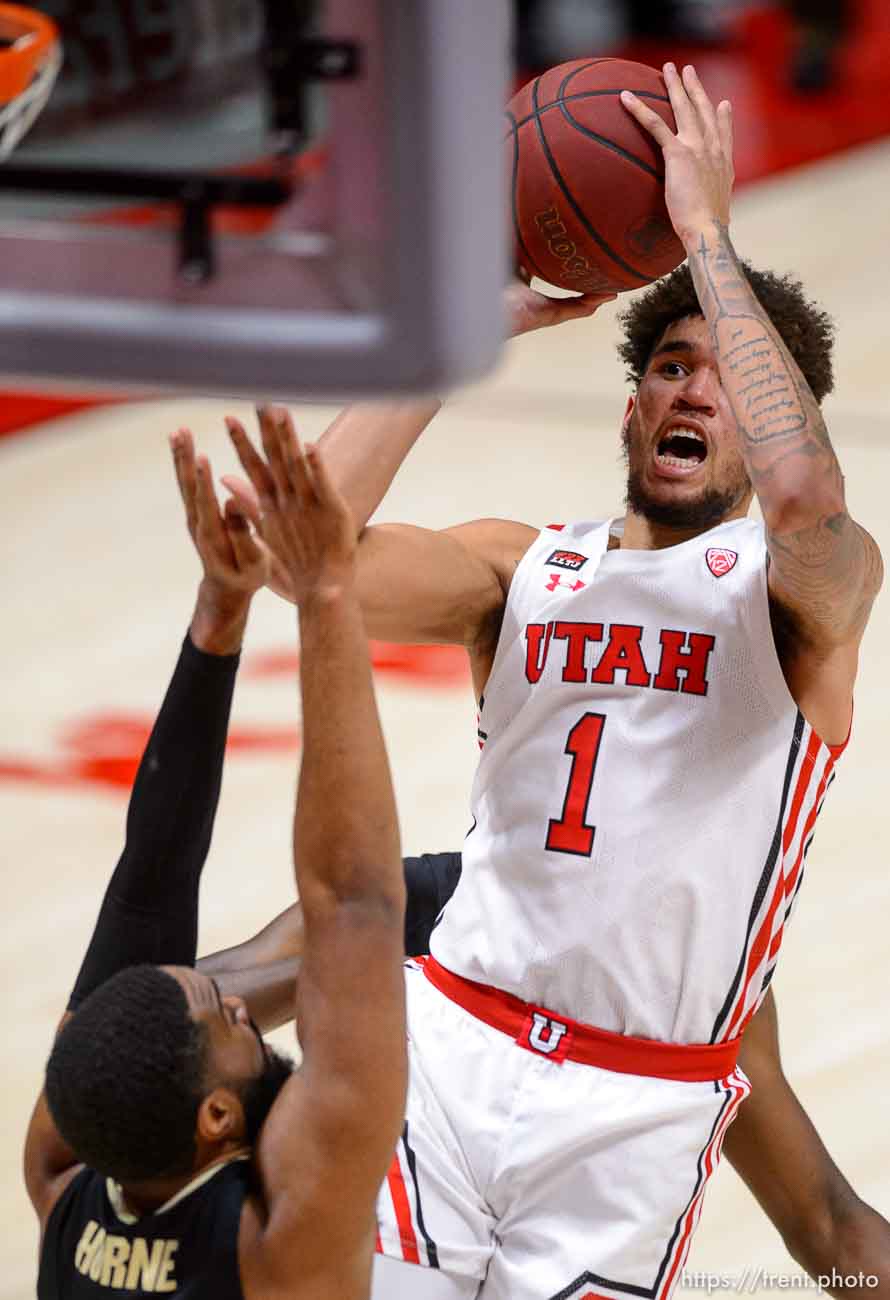 (Trent Nelson  |  The Salt Lake Tribune) Utah Utes forward Timmy Allen (1) shoots over Colorado Buffaloes forward Jeriah Horne (41) as Utah hosts Colorado, NCAA basketball in Salt Lake City on Monday, Jan. 11, 2021.