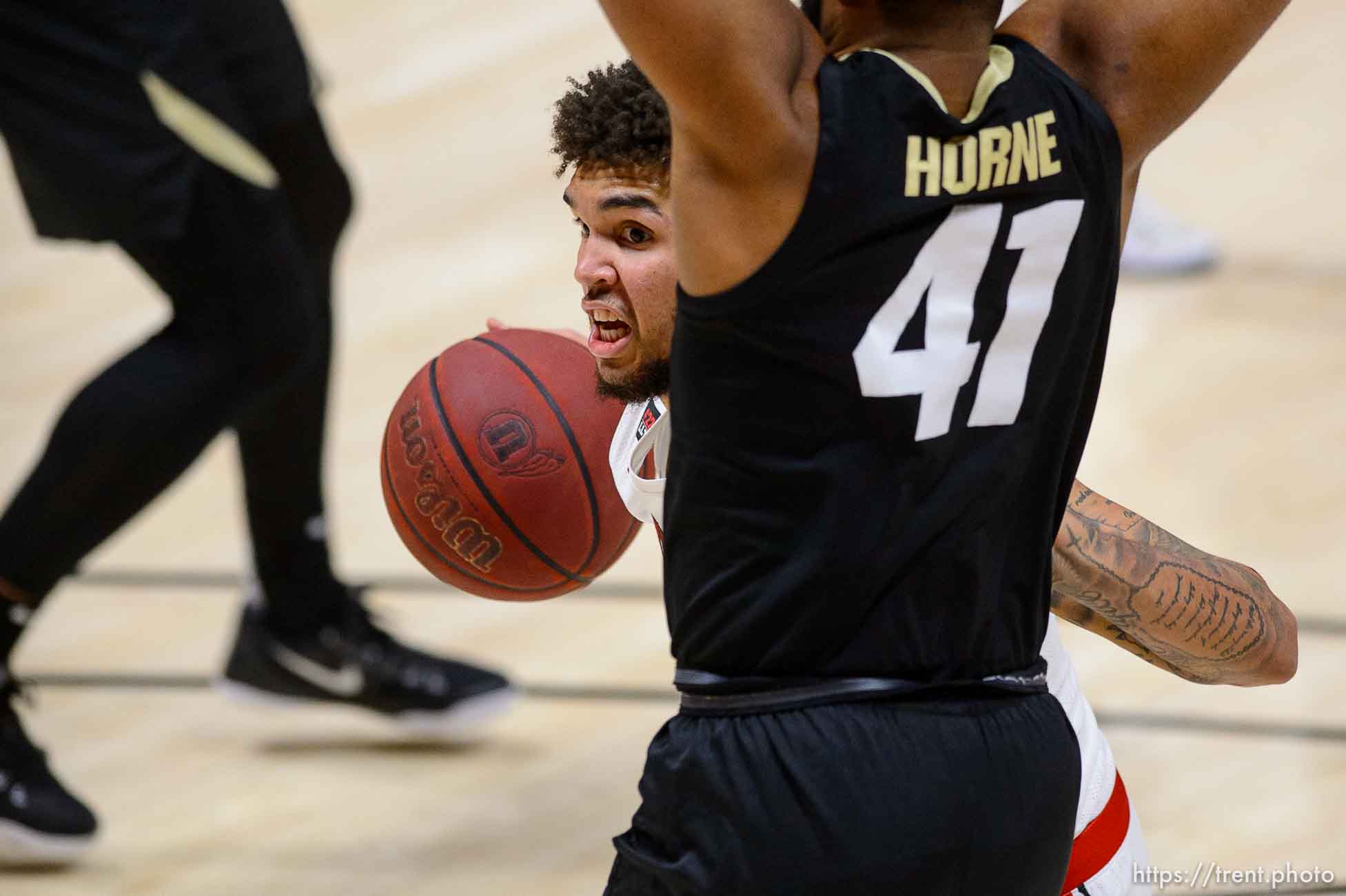 (Trent Nelson  |  The Salt Lake Tribune) Utah Utes forward Timmy Allen (1) drives on Colorado Buffaloes forward Jeriah Horne (41) as Utah hosts Colorado, NCAA basketball in Salt Lake City on Monday, Jan. 11, 2021.