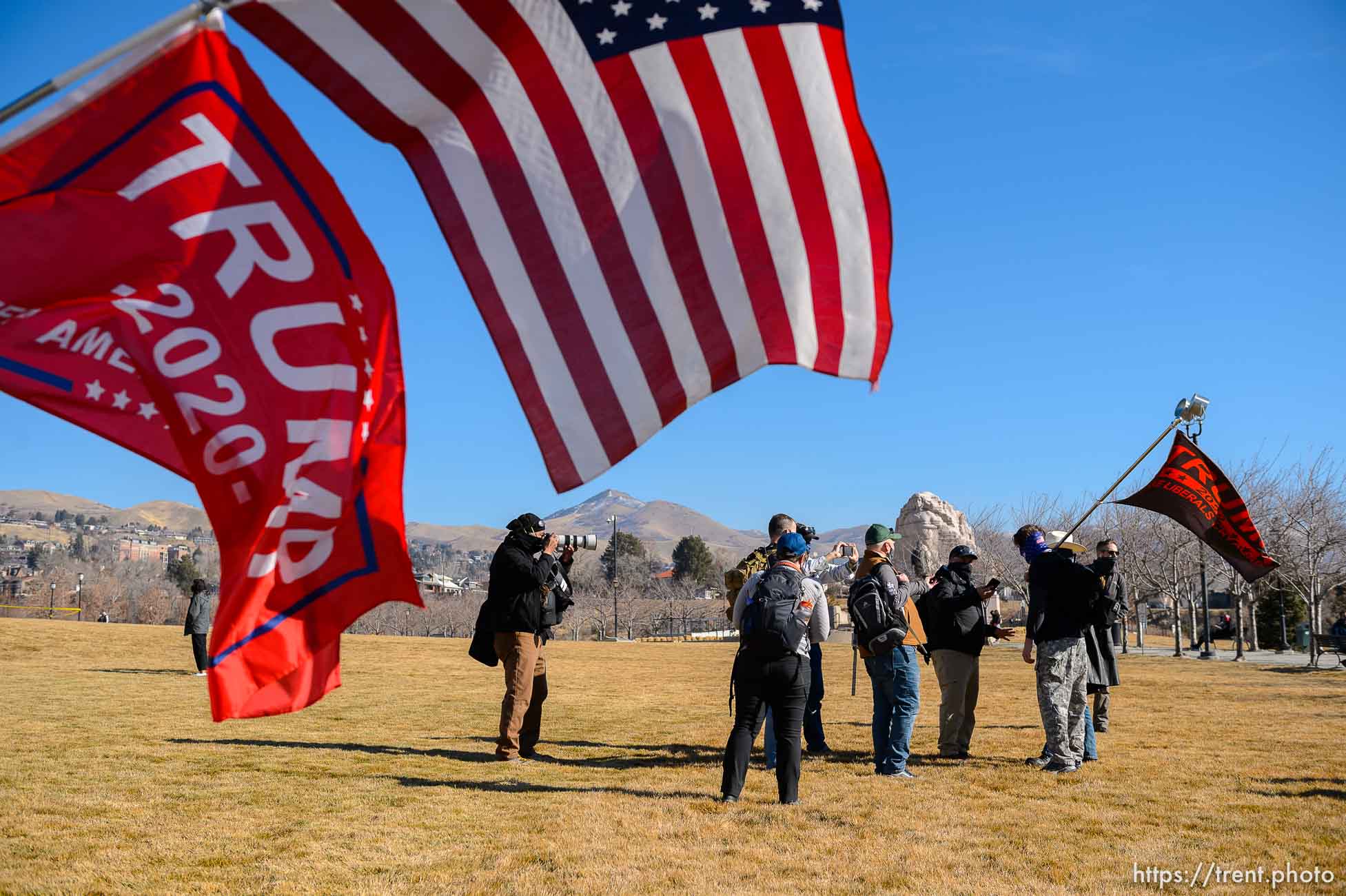 (Trent Nelson  |  The Salt Lake Tribune) Journalists outnumber a pair of Trump supporters at the state Capitol in Salt Lake City on Sunday, Jan. 17, 2021.