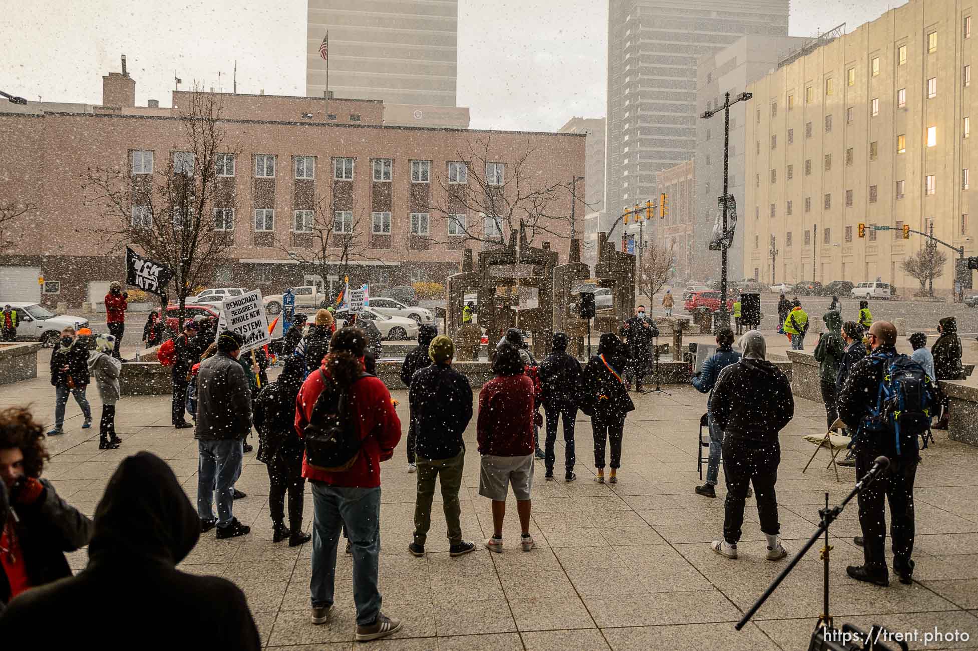 (Trent Nelson  |  The Salt Lake Tribune) Snow falls on a rally at the Federal Building in Salt Lake City on Martin Luther King Jr. Day, Monday, Jan. 18, 2021.