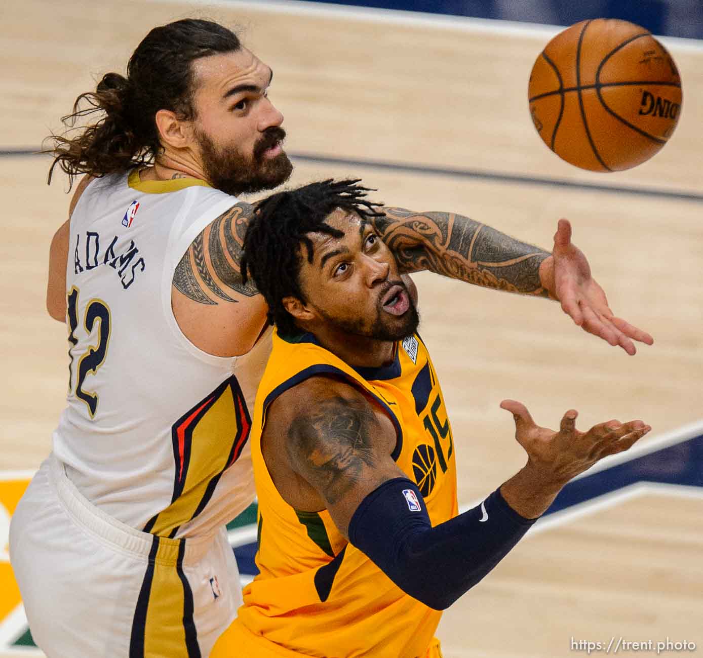 (Trent Nelson  |  The Salt Lake Tribune) Utah Jazz center Derrick Favors (15) pulls in a rebound ahead of New Orleans Pelicans center Steven Adams (12) as the Utah Jazz host the New Orleans Pelicans, NBA basketball in Salt Lake City on Tuesday, Jan. 19, 2021.