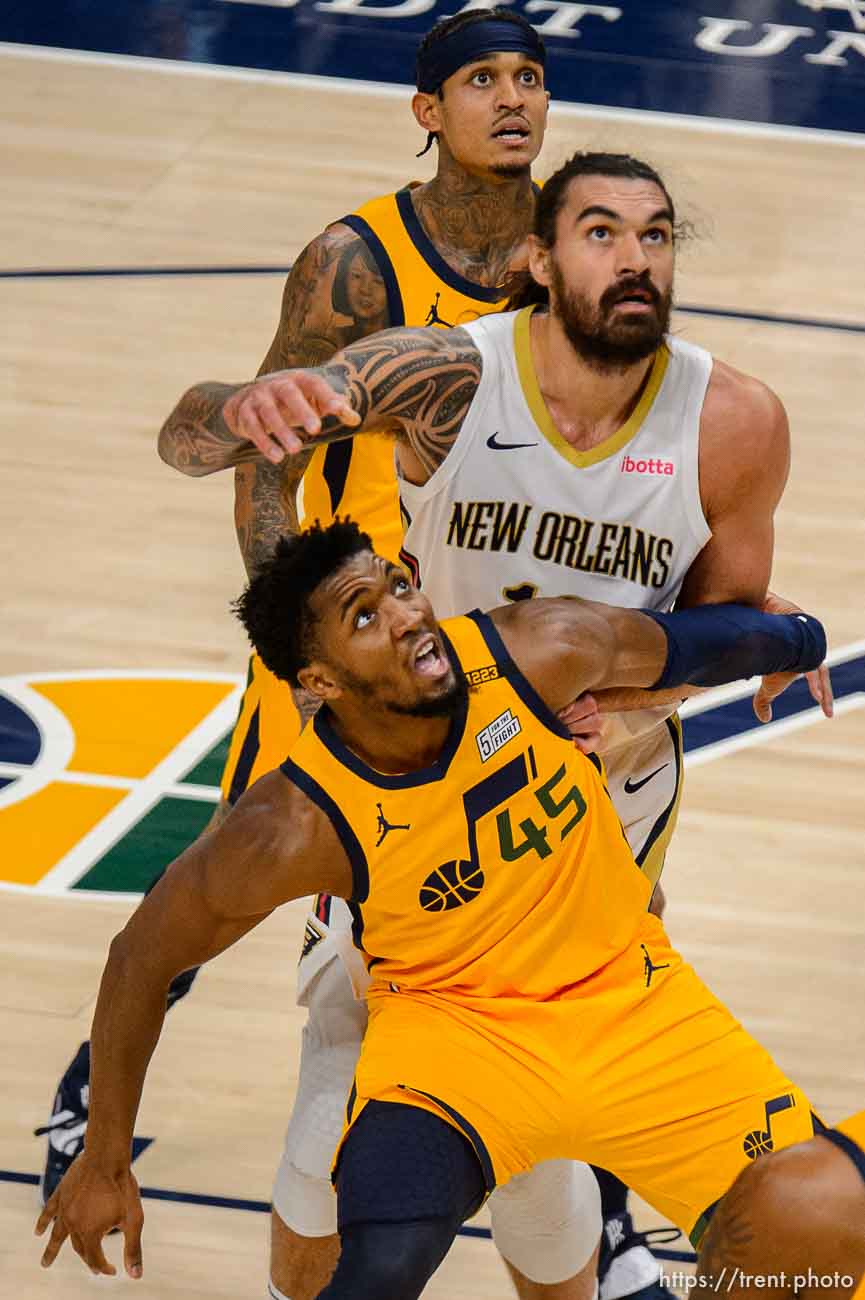 (Trent Nelson  |  The Salt Lake Tribune) Utah Jazz guard Donovan Mitchell (45), New Orleans Pelicans center Steven Adams (12), and Utah Jazz guard Jordan Clarkson (00) look at the ball as the Utah Jazz host the New Orleans Pelicans, NBA basketball in Salt Lake City on Tuesday, Jan. 19, 2021.