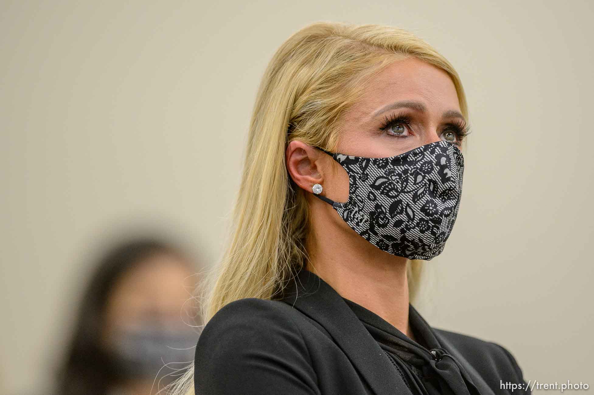 (Trent Nelson  |  The Salt Lake Tribune) Paris Hilton listens to Jeff Netto, a fellow victim, testify on SB-127 to the Senate Judiciary, Law Enforcement, and Criminal Justice Standing Committee in Salt Lake City on Monday, Feb. 8, 2021.