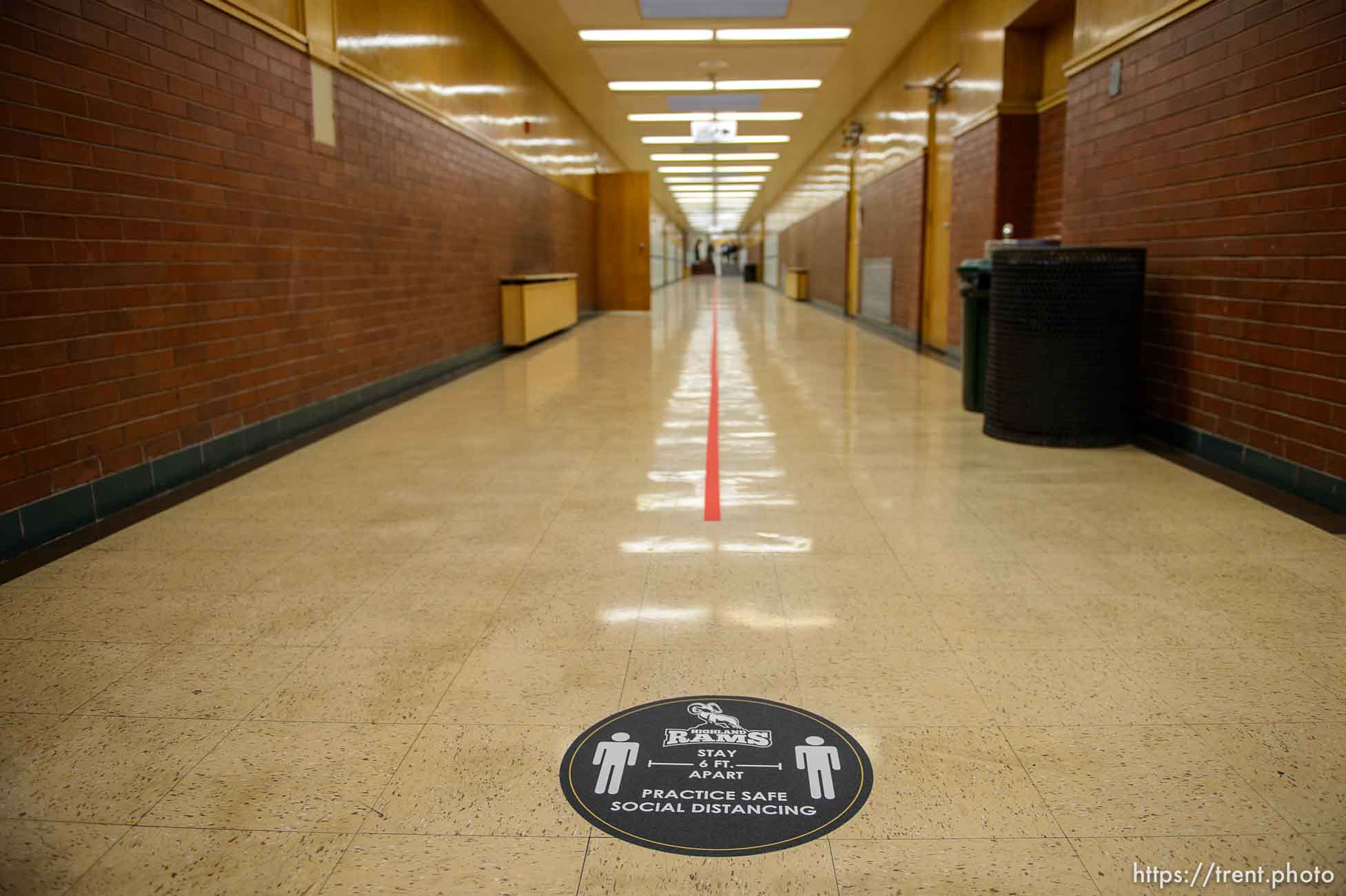 (Trent Nelson  |  The Salt Lake Tribune) A social distancing marker in a hallway as students return to Highland High School in Salt Lake City on Monday, Feb. 8, 2021.