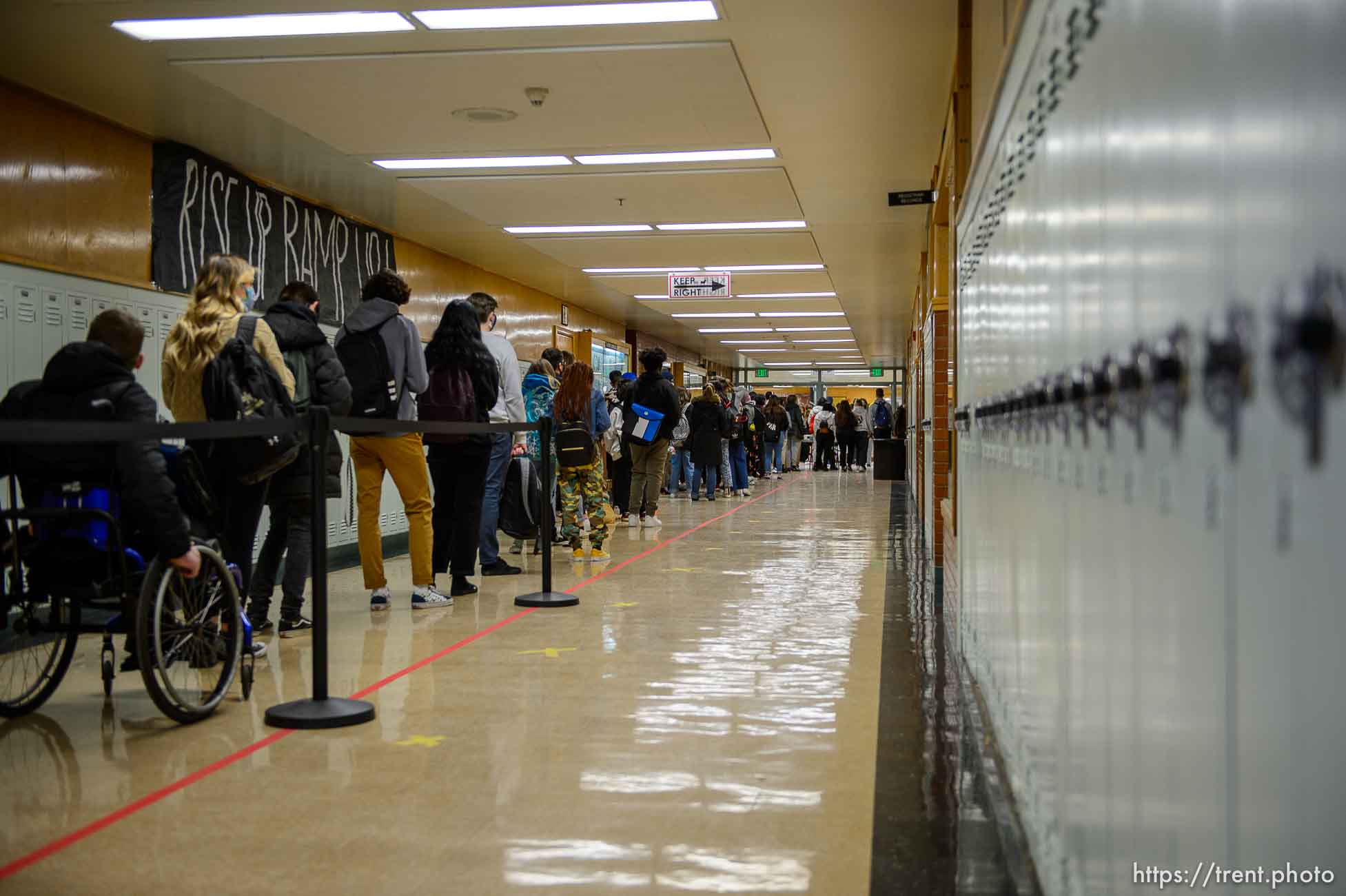 (Trent Nelson  |  The Salt Lake Tribune) Students line up for COVID-19 tests as they return to Highland High School in Salt Lake City on Monday, Feb. 8, 2021.