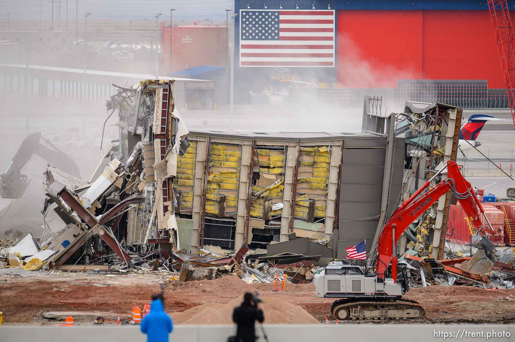 (Trent Nelson  |  The Salt Lake Tribune) The Delta Tower at the Salt Lake City International Airport is demolished on Monday, Feb. 15, 2021. The tower was originally built around 1989-90 for Delta Air Lines to direct aircraft to their gates after the FAA hands over the planes. The tower, which stands at 84 feet high, continued to operate until The New SLC opened on Sept. 15 and the replacement Delta tower became operational.