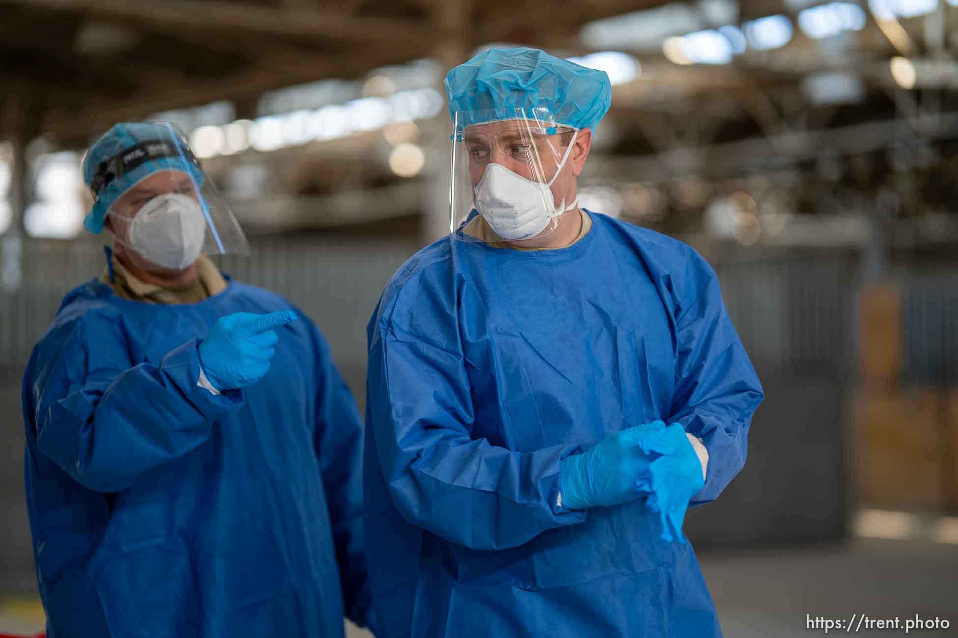 (Trent Nelson  |  The Salt Lake Tribune) Captain Jason Burton, right, and Sgt. 1st Class Sean Conorich working at a COVID-19 testing site run by the Utah National Guard at the Utah State Fairpark in Salt Lake City on Thursday, Feb. 25, 2021.