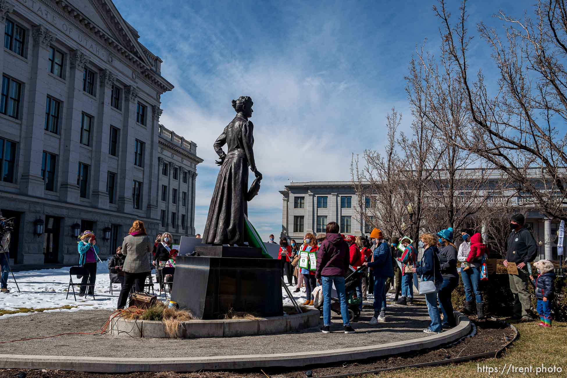 (Trent Nelson  |  The Salt Lake Tribune) People gather in support of the Equal Rights Amendment (ERA) in front of a statue of Martha Hughes Cannon at the state Capitol in Salt Lake City on Tuesday, March 2, 2021.