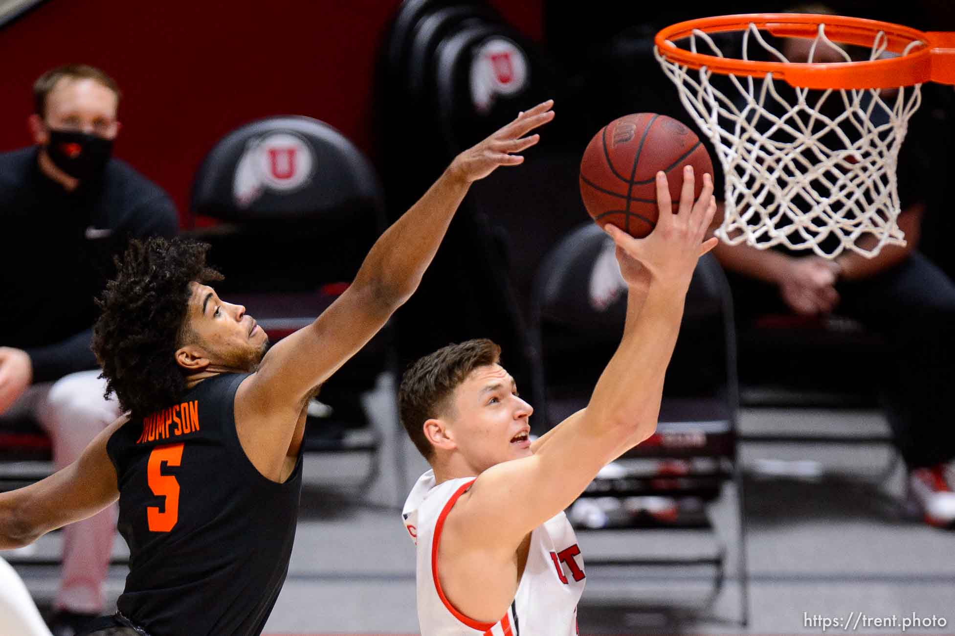 (Trent Nelson  |  The Salt Lake Tribune) Utah Utes guard Pelle Larsson (3) scores ahead of Oregon State Beavers guard Ethan Thompson (5) as Utah hosts Oregon State, NCAA basketball in Salt Lake City on Wednesday, March 3, 2021.