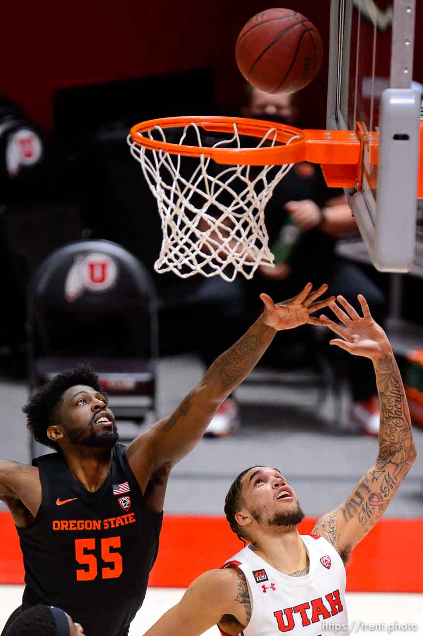 (Trent Nelson  |  The Salt Lake Tribune) Utah Utes forward Timmy Allen (1) shoots, defended by Oregon State Beavers guard Tariq Silver (55) as Utah hosts Oregon State, NCAA basketball in Salt Lake City on Wednesday, March 3, 2021.