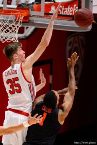 (Trent Nelson  |  The Salt Lake Tribune) Utah Utes center Branden Carlson (35) blocks a shot by Oregon State Beavers forward Maurice Calloo (1) as Utah hosts Oregon State, NCAA basketball in Salt Lake City on Wednesday, March 3, 2021.