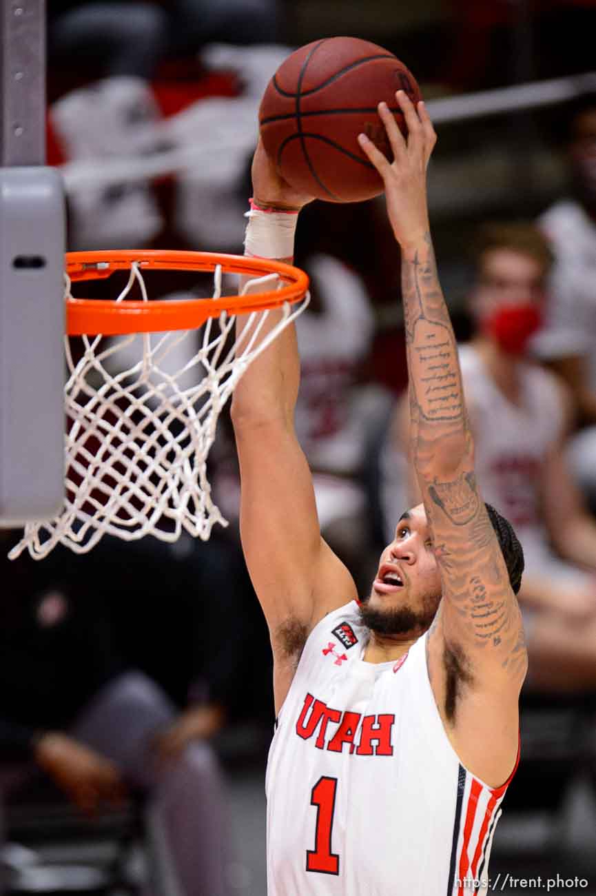 (Trent Nelson  |  The Salt Lake Tribune) Utah Utes forward Timmy Allen (1) dunks the ball as Utah hosts Oregon State, NCAA basketball in Salt Lake City on Wednesday, March 3, 2021.