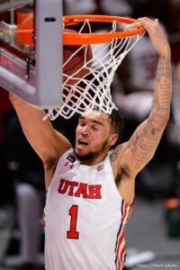 (Trent Nelson  |  The Salt Lake Tribune) Utah Utes forward Timmy Allen (1) dunks the ball as Utah hosts Oregon State, NCAA basketball in Salt Lake City on Wednesday, March 3, 2021.