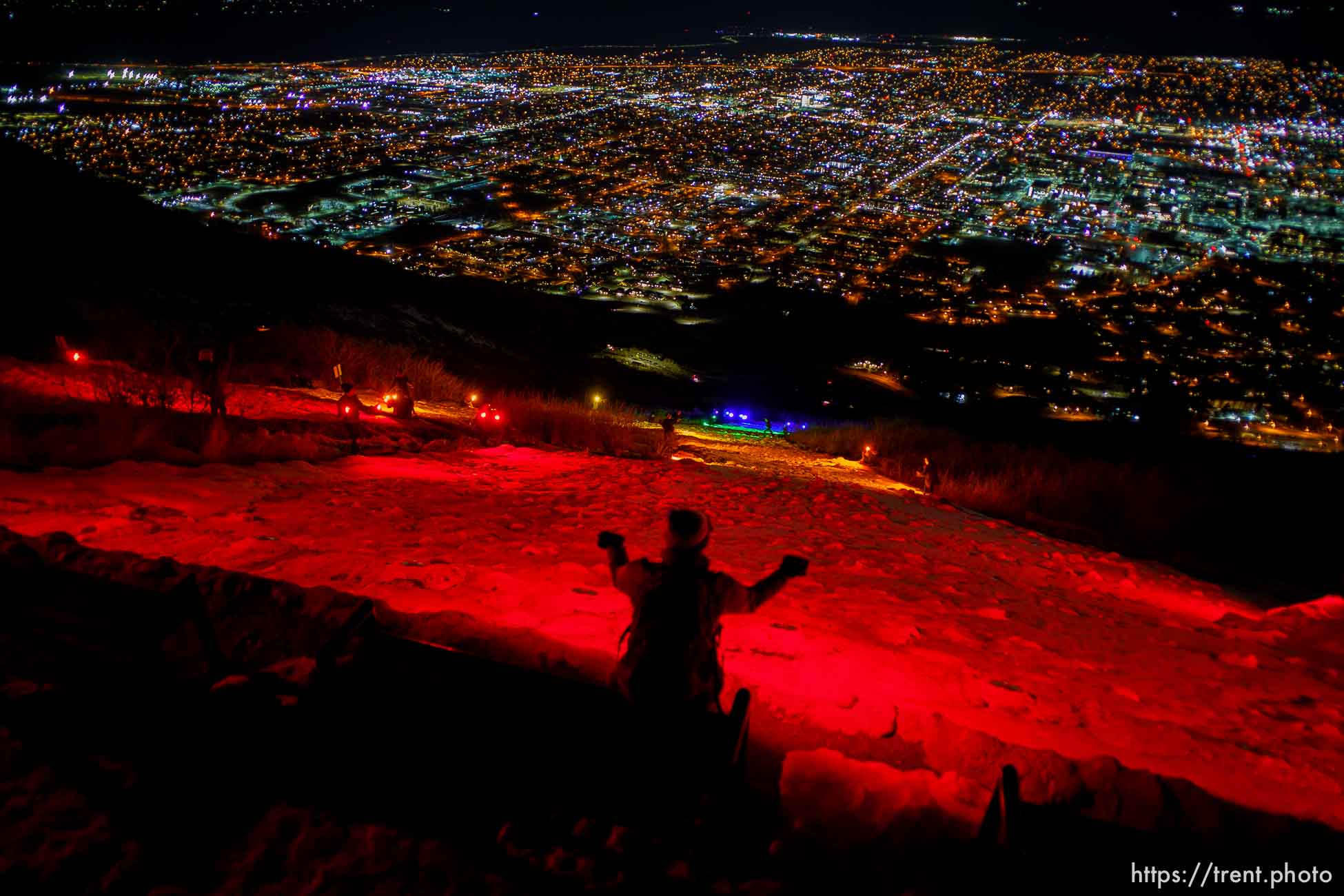 (Trent Nelson  |  The Salt Lake Tribune) A group of people, including many BYU students, shine Pride colors on the Y on the mountain above BYU in Provo on Thursday, March 4, 2021.
