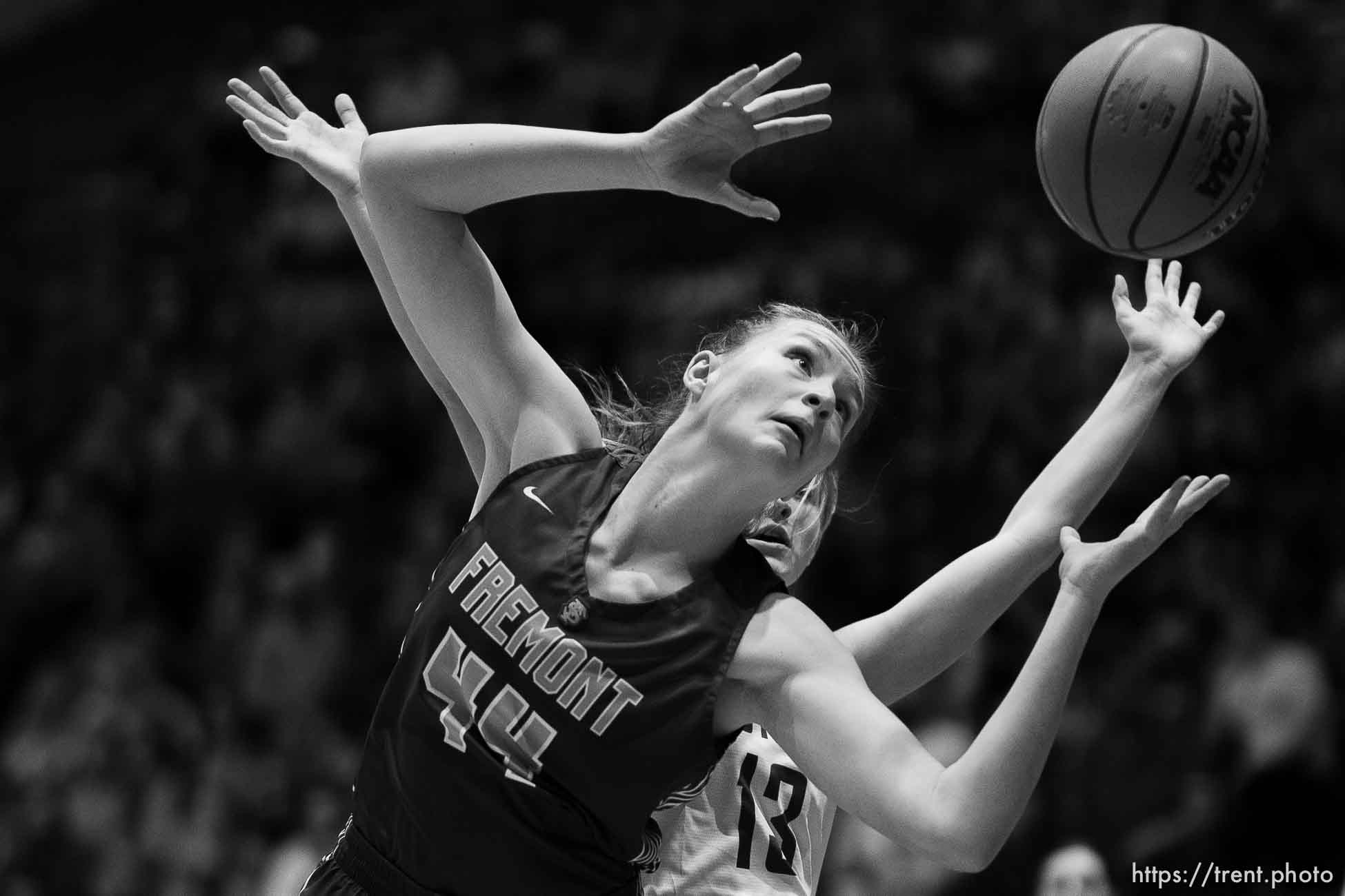 (Trent Nelson  |  The Salt Lake Tribune) Fremont's Maggie Mendelson reaches for a loose ball while facing Herriman in the 6A girls basketball state championship game, in Taylorsville on Saturday, March 6, 2021.