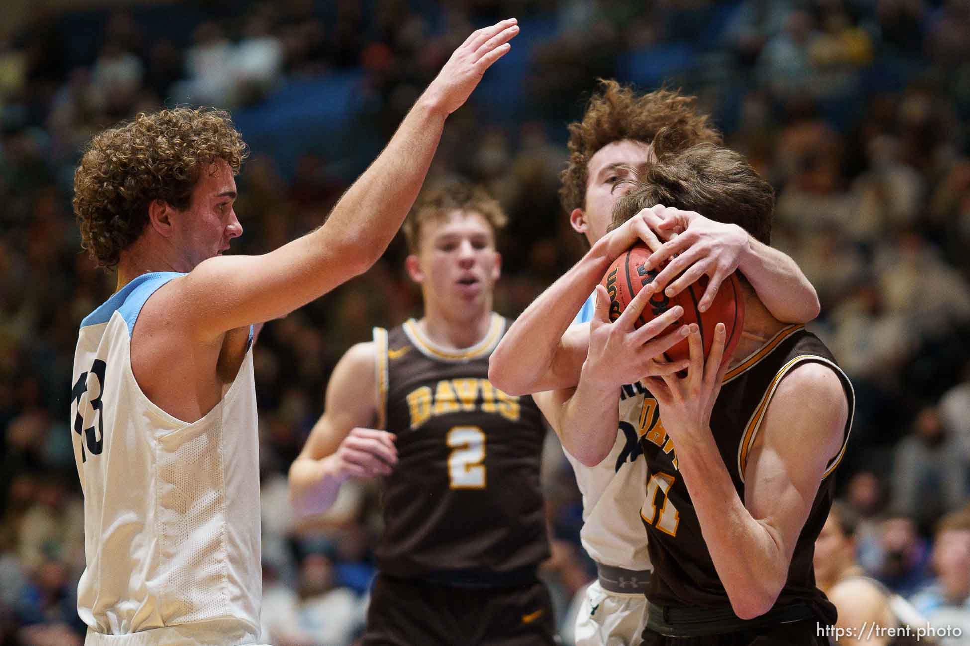 (Trent Nelson  |  The Salt Lake Tribune) Westlake's Kaden Hoppins wraps up Davis's Henry Ihrig as Davis defeats Westlake High School in the 6A boys basketball state championship game, in Taylorsville on Saturday, March 6, 2021.