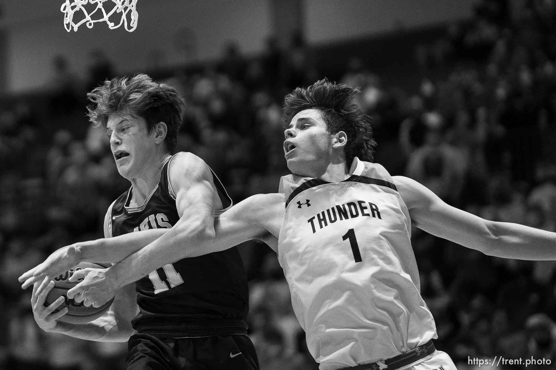 (Trent Nelson  |  The Salt Lake Tribune) Davis's Henry Ihrig and Westlake's Noah McCord as Davis defeats Westlake High School in the 6A boys basketball state championship game, in Taylorsville on Saturday, March 6, 2021.