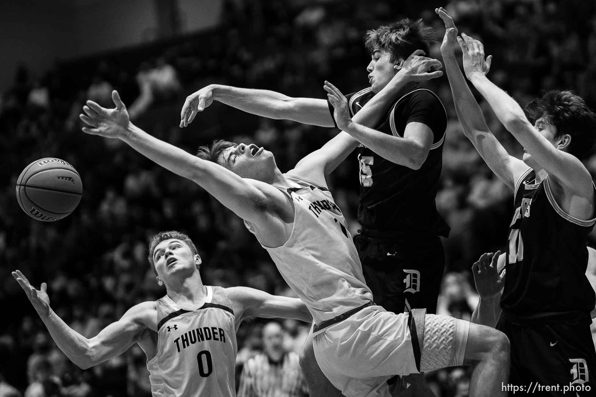 (Trent Nelson  |  The Salt Lake Tribune) Westlake's Noah Madsen and Noah McCord reach for a loose ball as Davis defeats Westlake High School in the 6A boys basketball state championship game, in Taylorsville on Saturday, March 6, 2021.
