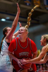 (Trent Nelson  |  The Salt Lake Tribune) 
as Springville faces Farmington High School in the 5A girls basketball state championship game, in Taylorsville on Saturday, March 6, 2021.  Addisyn Johnson defended by Delaney Baker