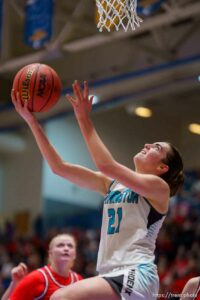 (Trent Nelson  |  The Salt Lake Tribune) Farmington's Amber Beddes scores as Springville faces Farmington High School in the 5A girls basketball state championship game, in Taylorsville on Saturday, March 6, 2021.