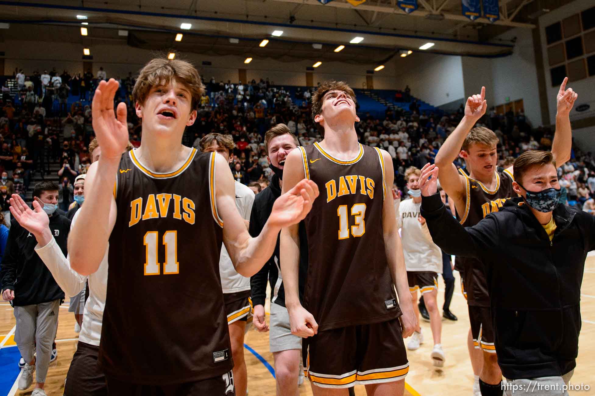 (Trent Nelson  |  The Salt Lake Tribune) Davis players celebrate after defeating Westlake High School in the 6A boys basketball state championship game, in Taylorsville on Saturday, March 6, 2021.