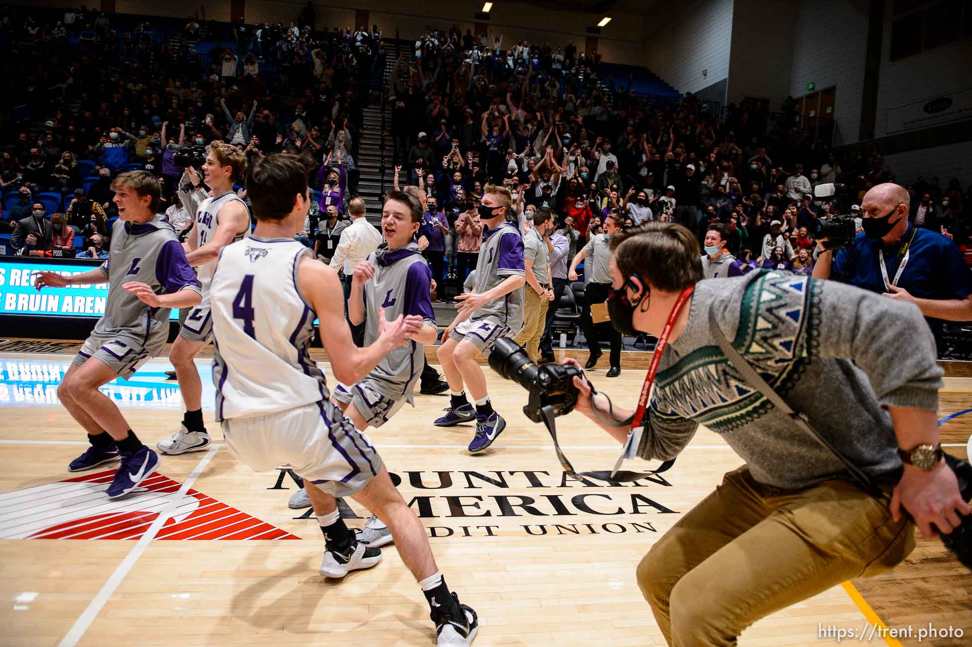 (Trent Nelson  |  The Salt Lake Tribune) Lehi players celebrate a win over Farmington High School in the 5A boys basketball state championship game, in Taylorsville on Saturday, March 6, 2021.  Isaac Hale